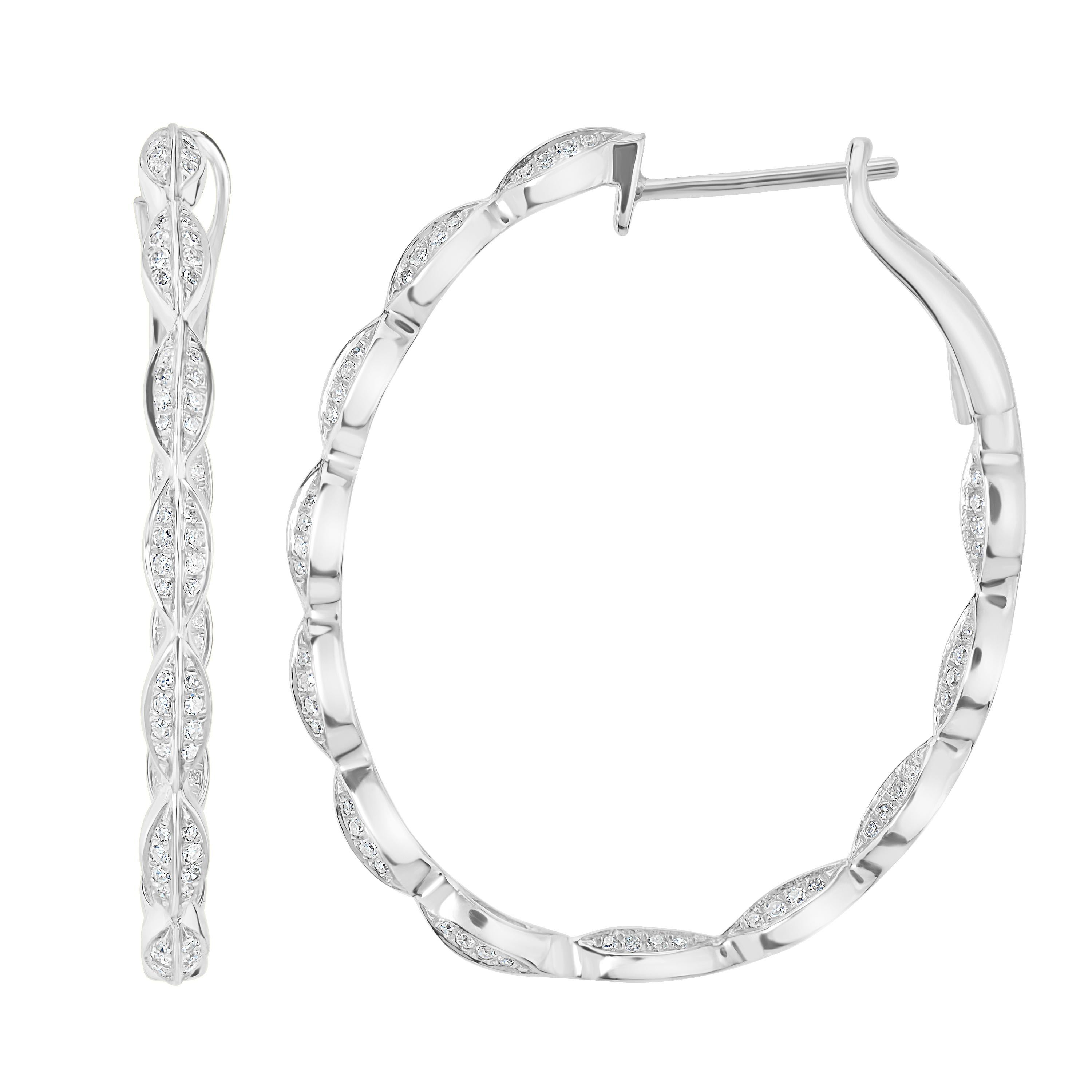 Gorgeous hoops featured with leaf motifs studded with diamonds. Each pair consists of 192 round diamonds in pave by Luxle. These earrings come with omega clasps for easy hassle-free wear.

Please follow the Luxury Jewels storefront to view the