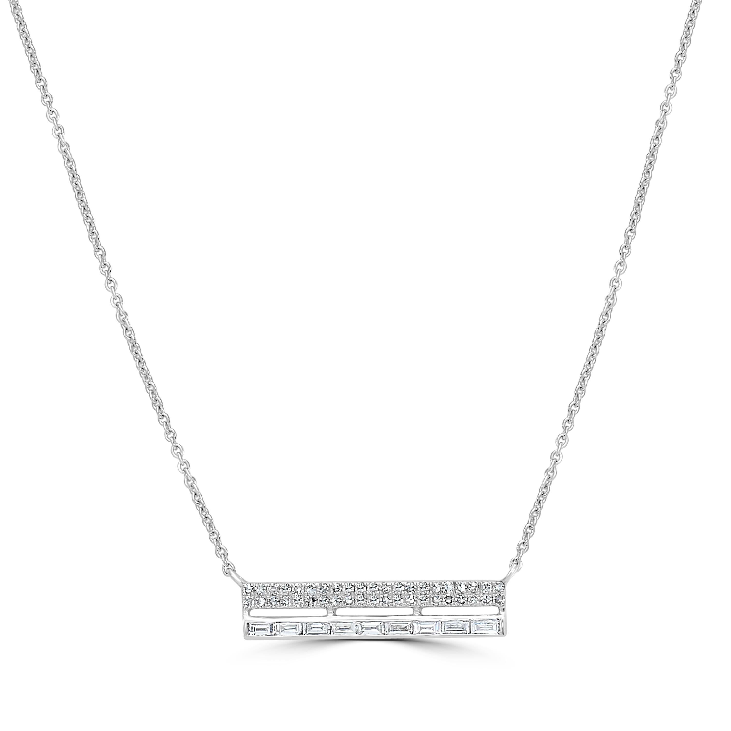 In a 14K White Gold setting, a magnificent diamond rectangular bar pendant necklace is fastened. The 0.24 carat round single-cut and baguette full-cut diamonds in this necklace are elegantly placed in the bar motif. This necklace, which comes with a