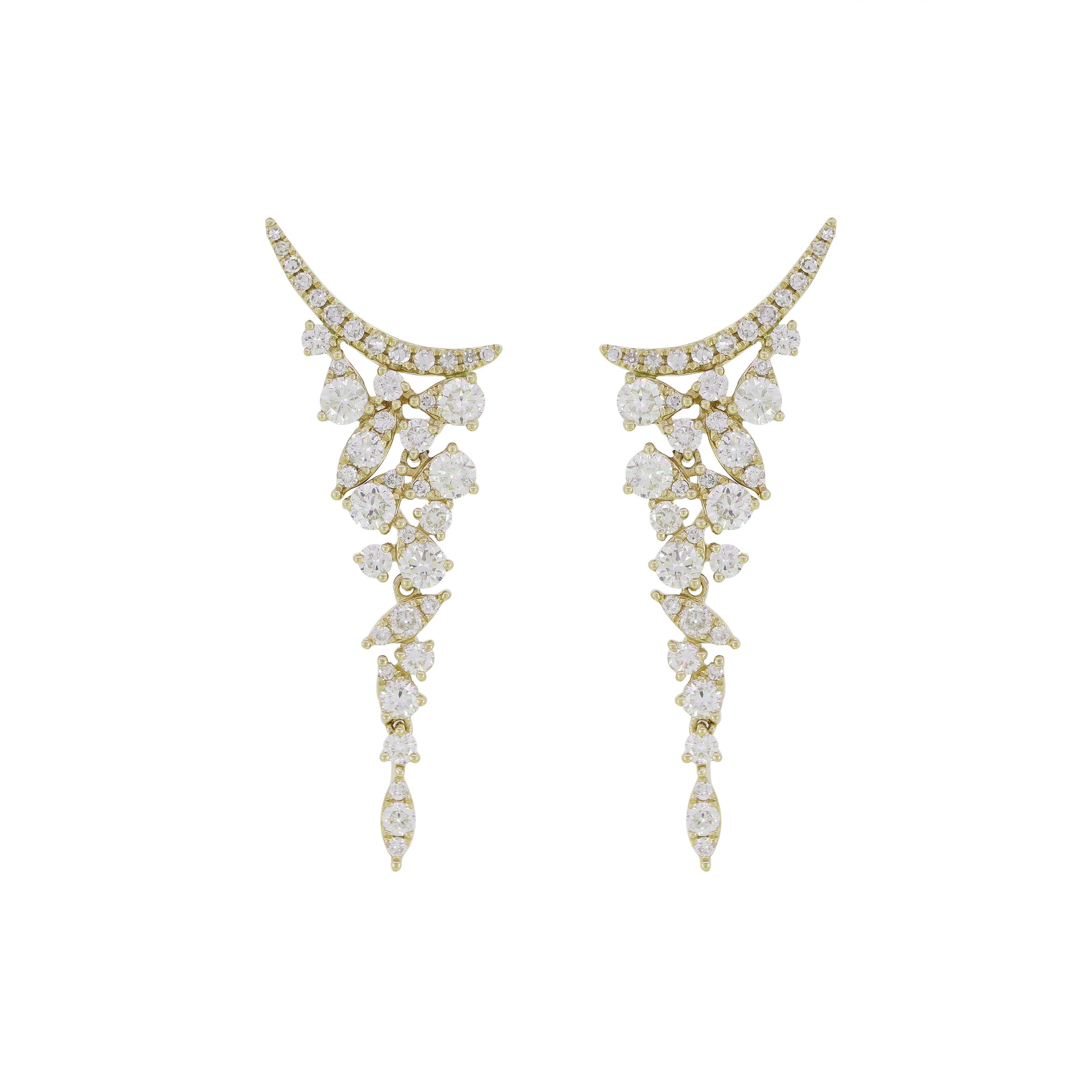You will definitely fall in love with these Luxle Round Diamond Chandelier Drop Earrings. Rendered in 18K yellow gold these elegant chandelier drops are illuminated with 82 big and small round diamonds totaling 1.15 Cts. These yellow drops are well