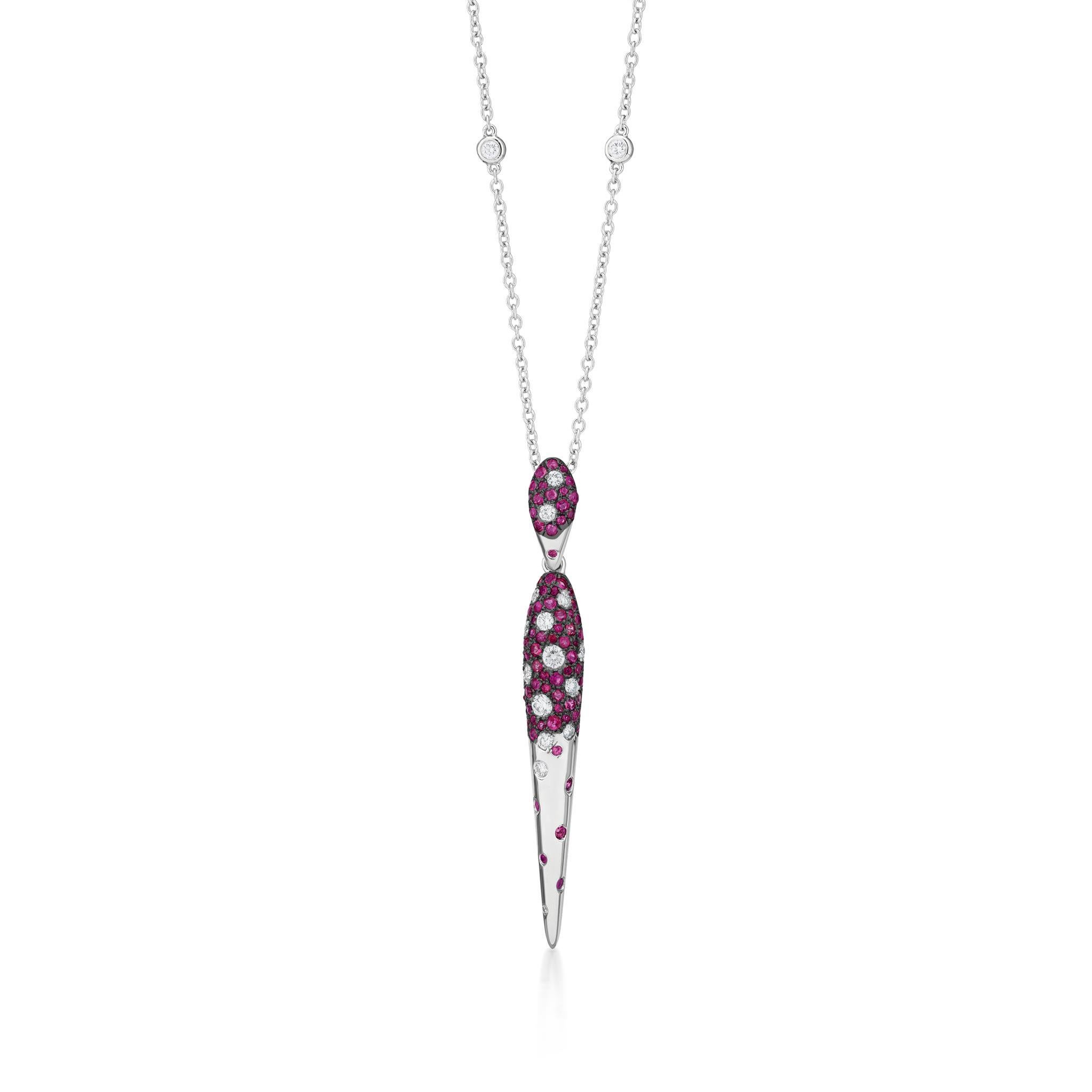 Elevate your elegance with the exquisite Luxle 1.36 Cttw. Ruby and Diamond Serpentine Pendant Necklace in 18K White Gold and Black Rhodium. A true masterpiece that seamlessly blends artistry with luxury, this necklace captures the allure of a