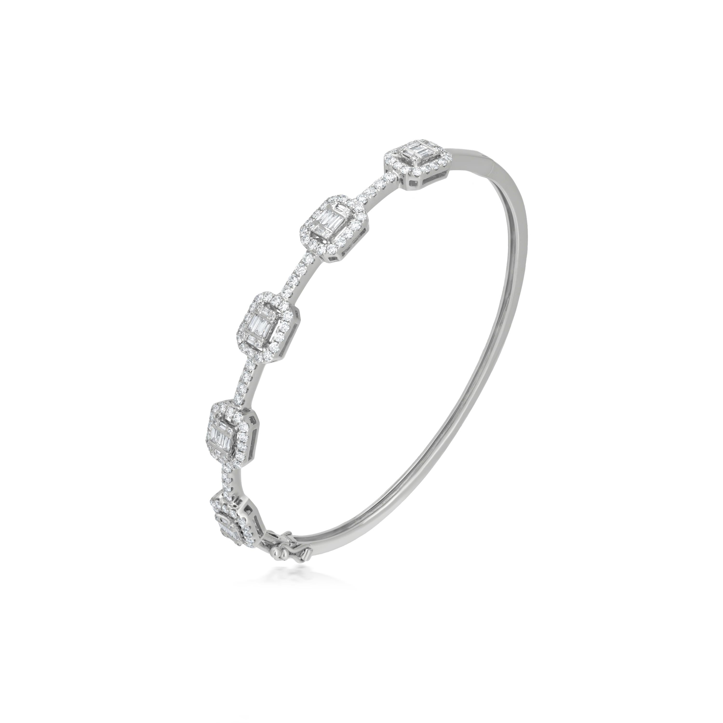 Adorn yourself with this spectacular diamond frames bangle bracelet of Luxle. Wrapping the front of the wrist in stately and sophisticated frames of 1.43 ct. t.w. baguette diamonds accentuated by round diamond halo. The frames are mounted on