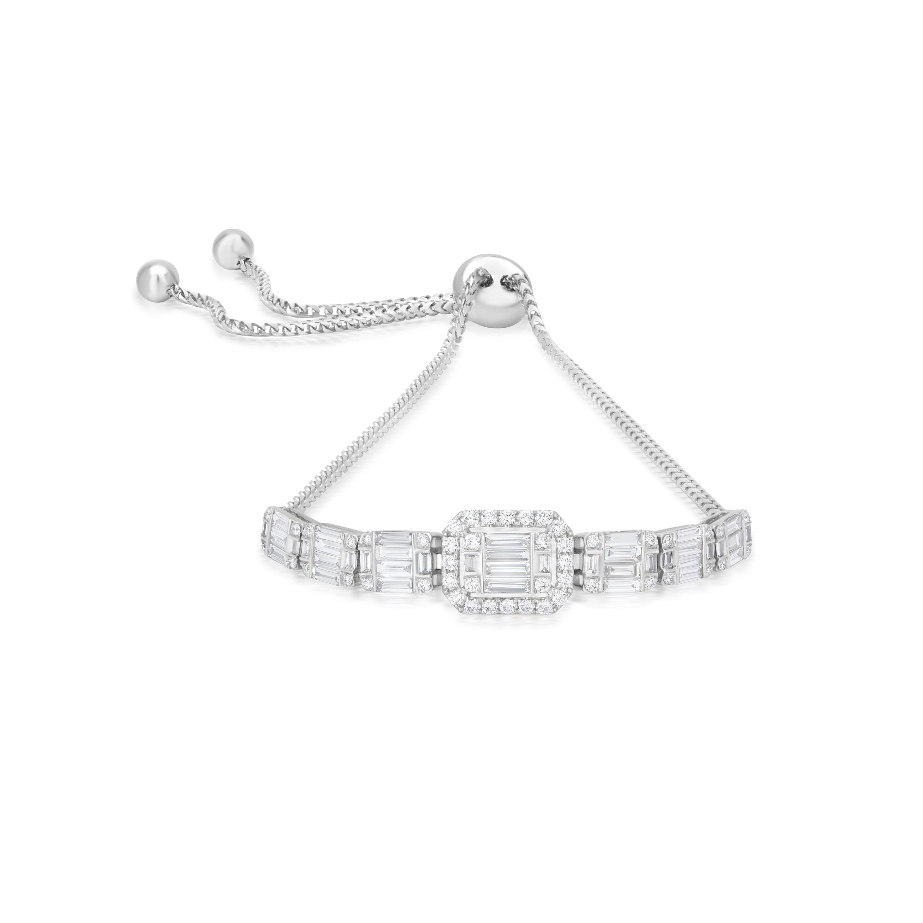 This Luxle 1.60 Ct. T.W. Diamond Bolo Bracelet in 18k White Gold  sparkles with diamond clusters. Dazzling to fit most wrists it features a baguette and round diamond cluster at its center enclosed by a diamond halo. The central cluster is flanked
