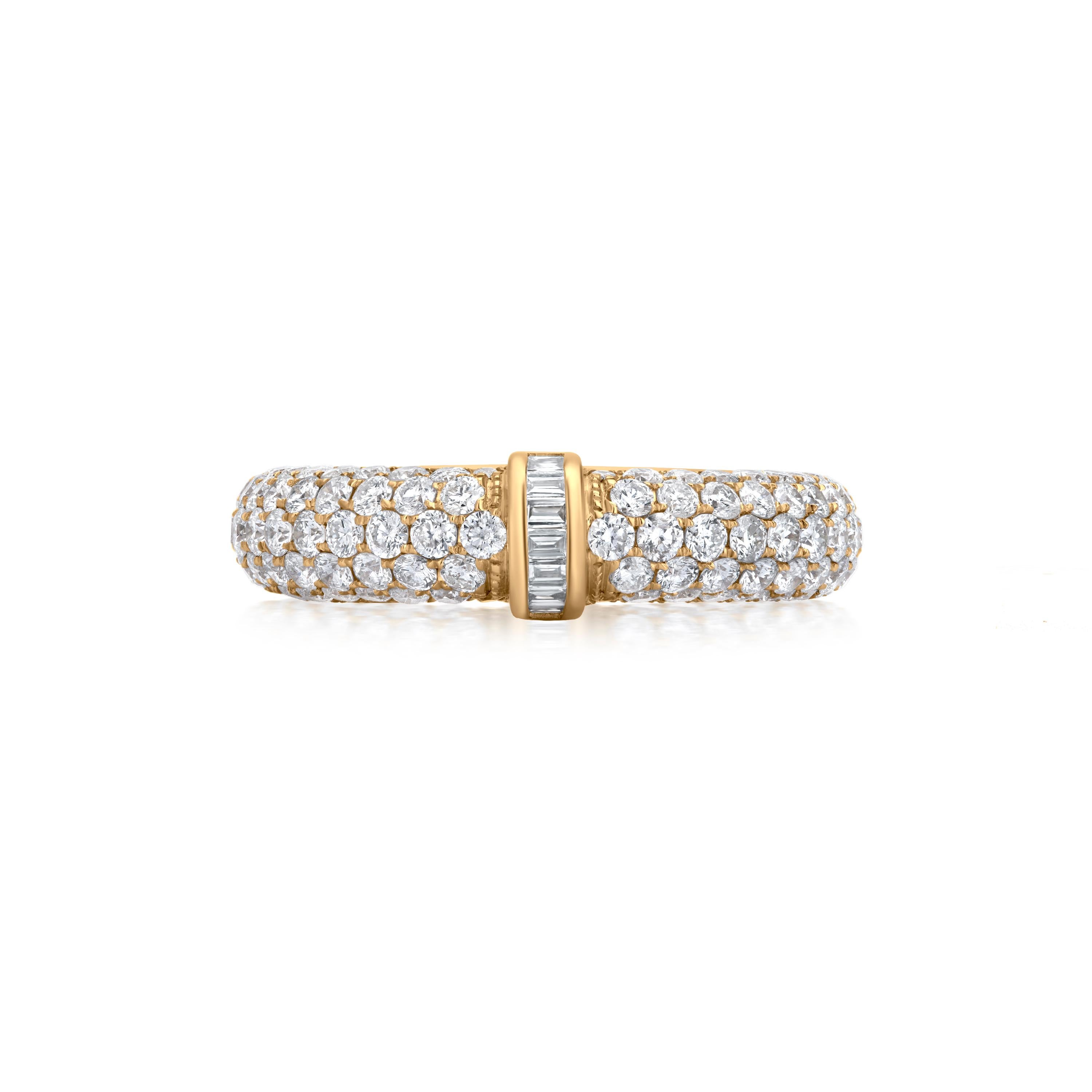 Display the utmost shine with this stunning diamond ring from Luxle. A channel of baguette diamonds is set in the middle of this 18K yellow gold diamond band ring. Rows of round pave diamonds are arranged in a border around the baguette diamonds in