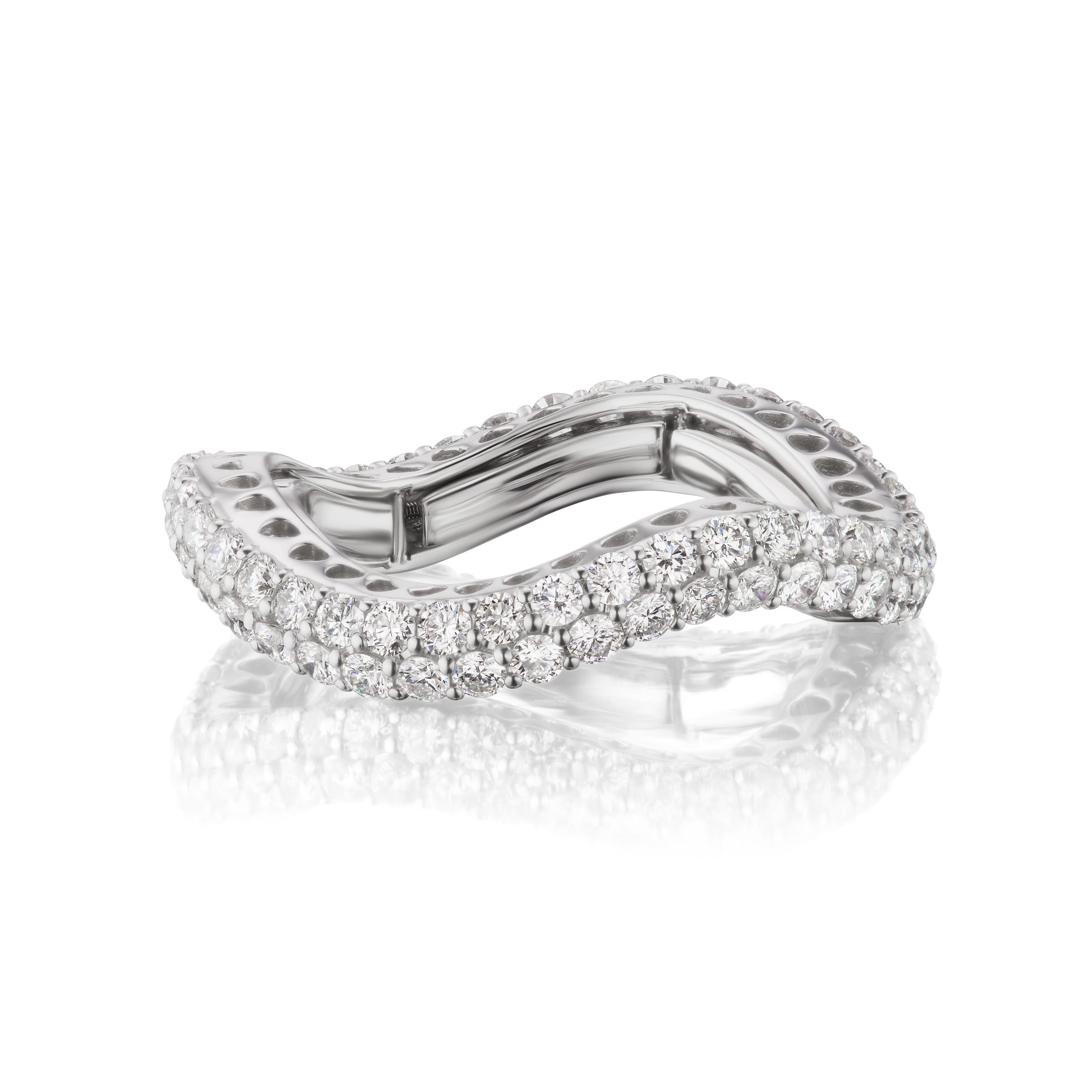 This Luxle ring is adorned with sparkling round cut diamonds embellished in a swirl design. Each band ring is made with 82 round cut diamonds. This ring is adjustable and gives you the ability to wear in any finger. It is a stretchable ring and it