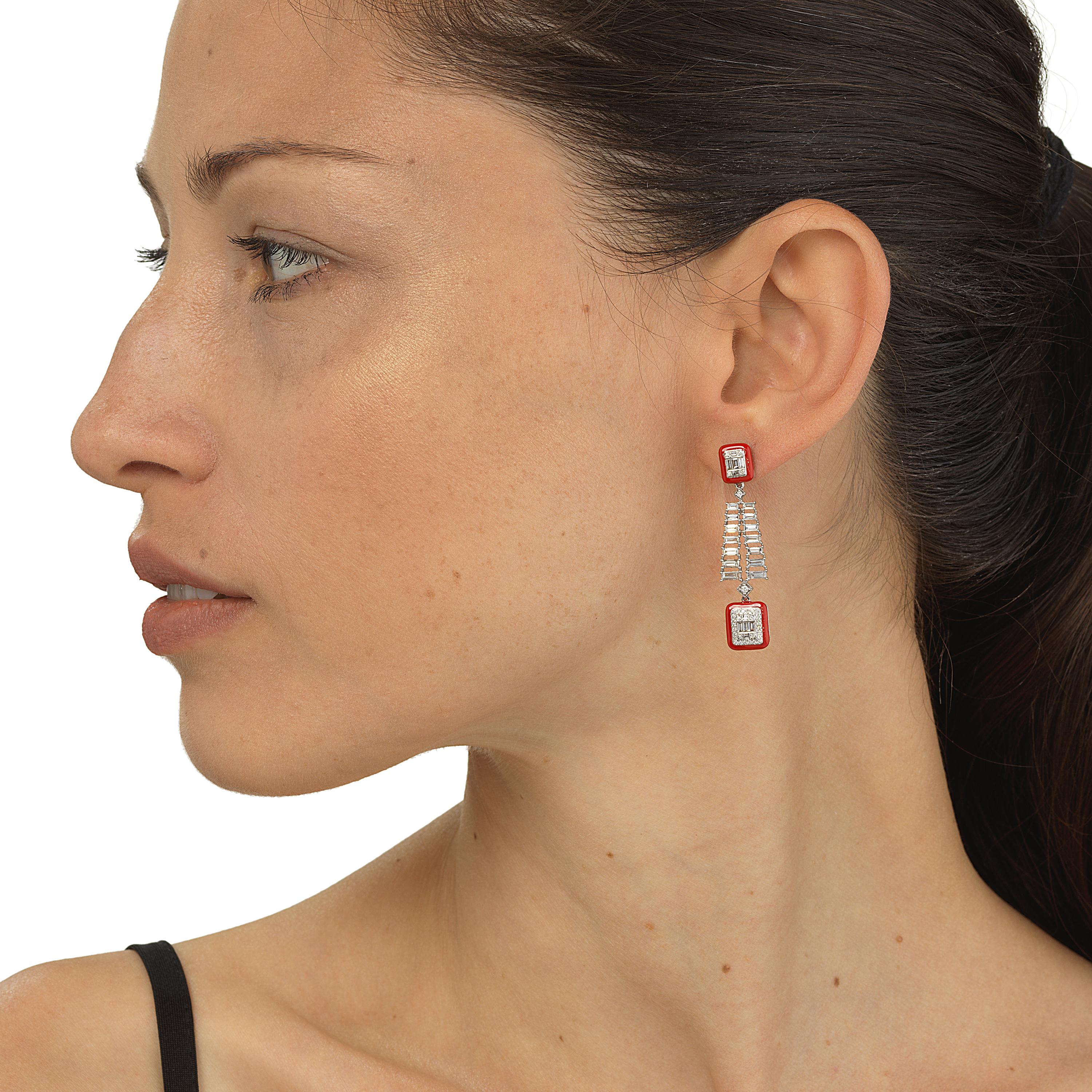 A pair crafted in 18 Karat white gold featured cascading baguette diamonds with frame-shaped drops by Luxle. Each pair is embellished with 1.65 Cts of diamonds. The hand-painted red enamel adds a pop of color to the pair. It comes with a post and