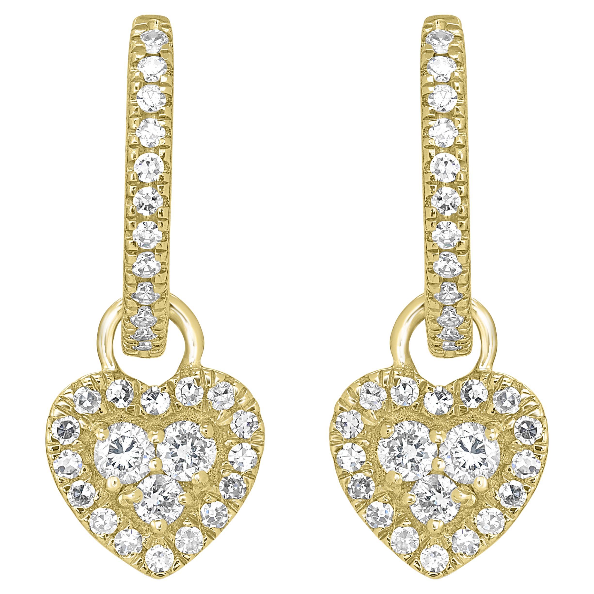 Make a stunning impression with these heart hoop drop earrings made by Luxle with 14k gold and genuine diamonds. An item adorned with diamonds is the ultimate representation of the heart motif. These lobe-hugging earrings have a lovely heart drop