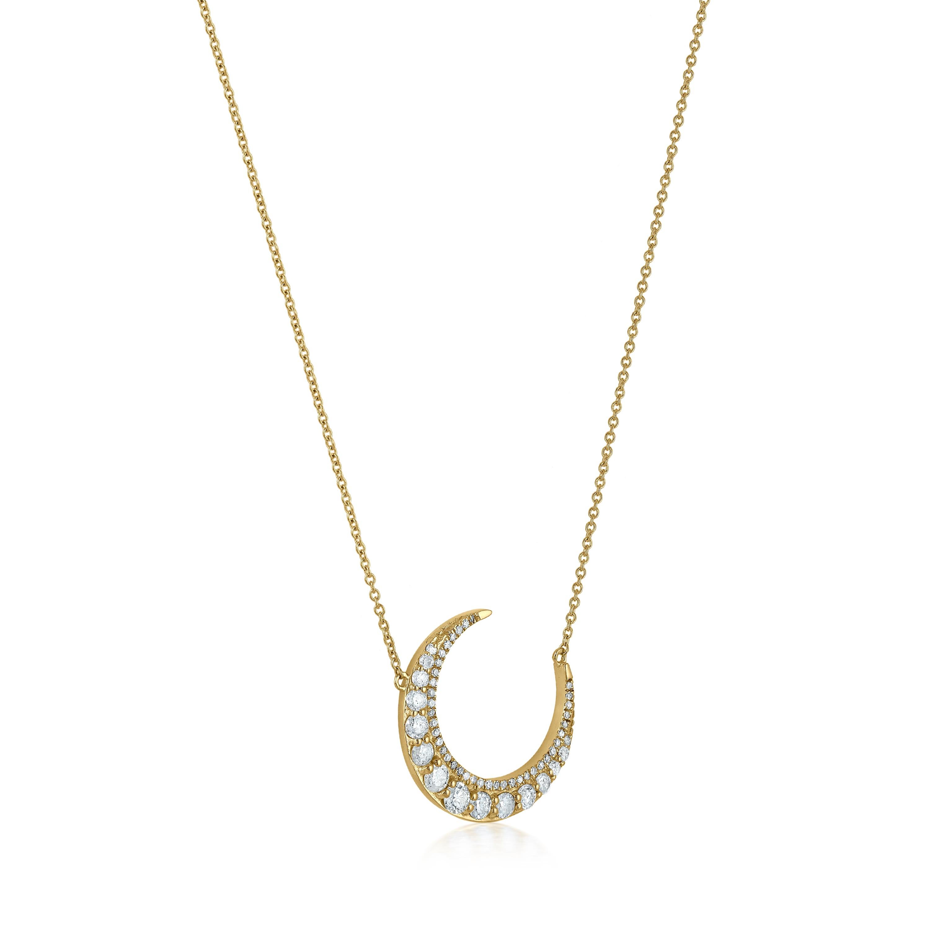 Featuring a crescent moon pendant decorated with dazzling diamonds by Luxle, this 14k yellow gold necklace takes your look to new heights. This pendant necklace is inspired by the grace of the moon and is as pure as the 0.69 Carats round full-cut