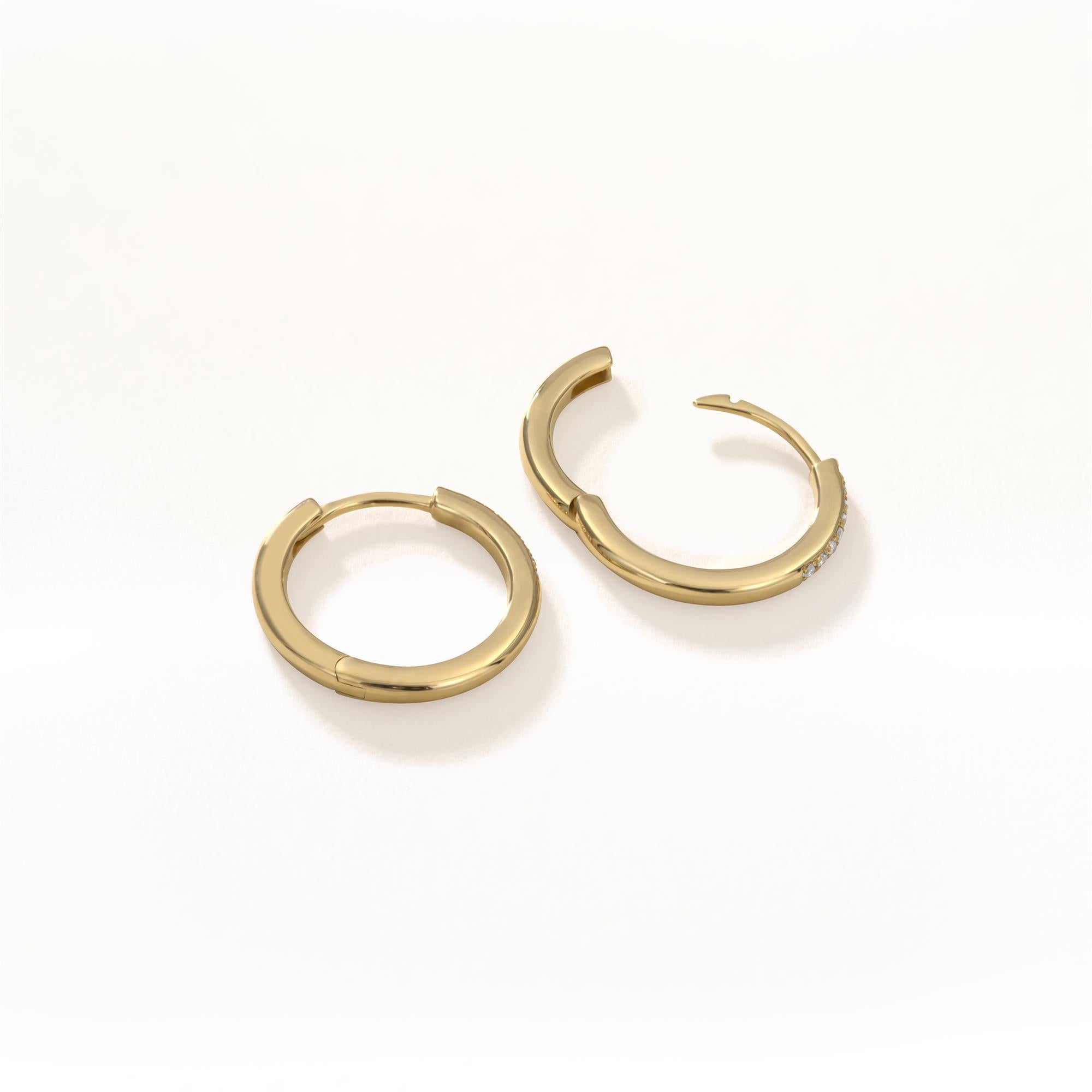 Elevate your everyday with these stunning luxle demi Pave Diamond Huggie Hoop Earrings. Made from 18K gold, the hoop earrings have a modern sleek design and round diamonds with GH color to create a simply awe-inspiring look catching the light at