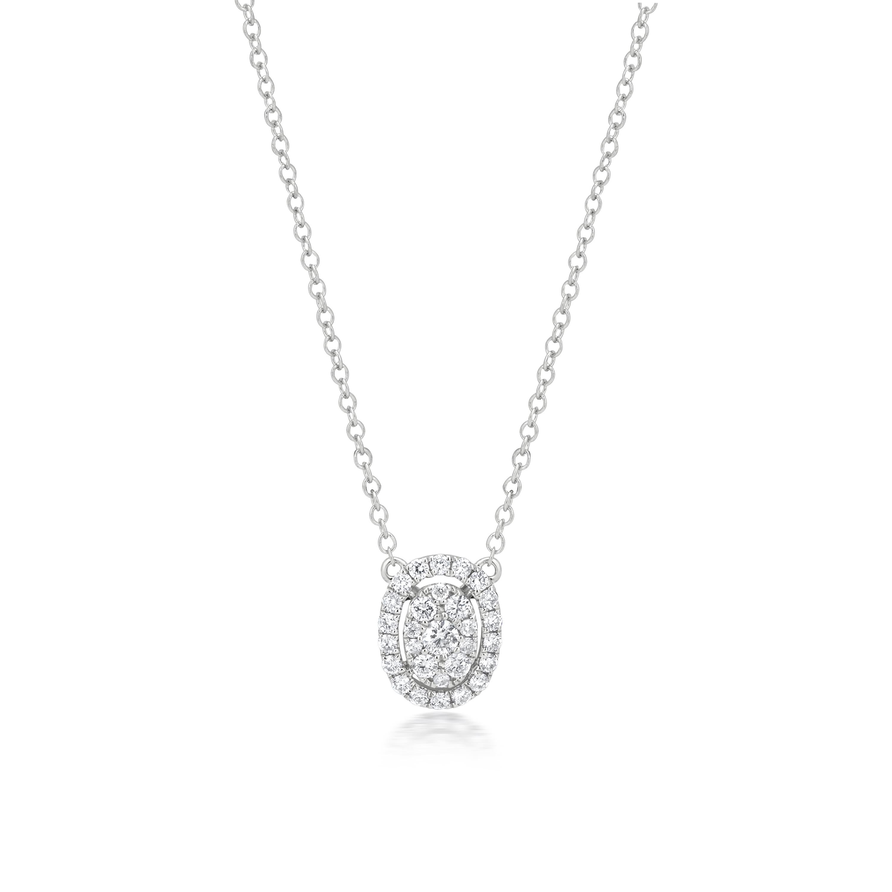 Luxle oval-shaped diamond cluster pendant that hangs from your neckline represents that you give each other the future, whatever it may contain. The new fashion statement is this cluster pendant necklace, which is subtle yet lovely. The pendant on