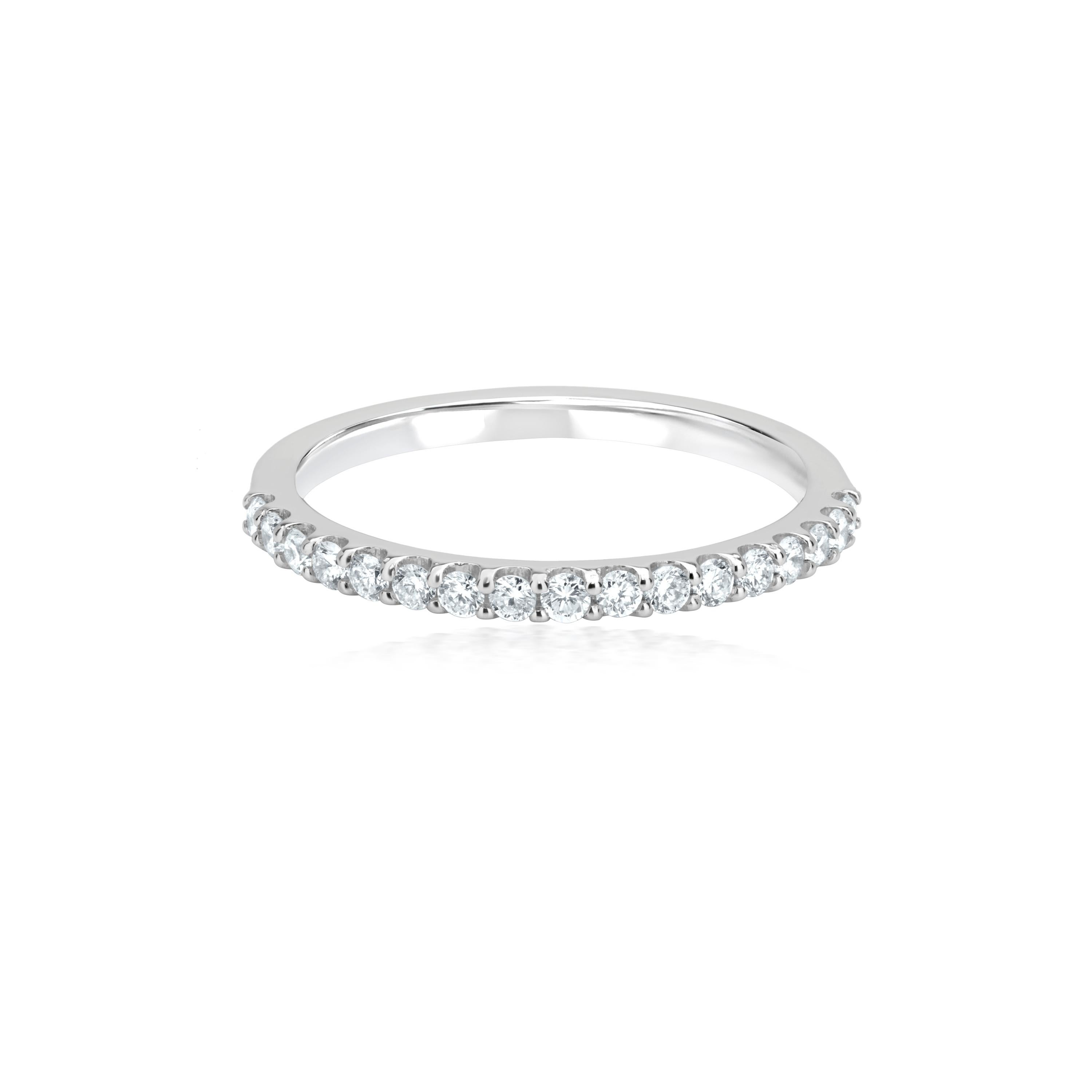 This elegant and understated band ring symbolizes an endless cycle of life, making it the ideal ring to mark your love for your spouse. This magnificent diamond ring by Luxle is embellished with round full-cut white diamonds in a micro pave setting.