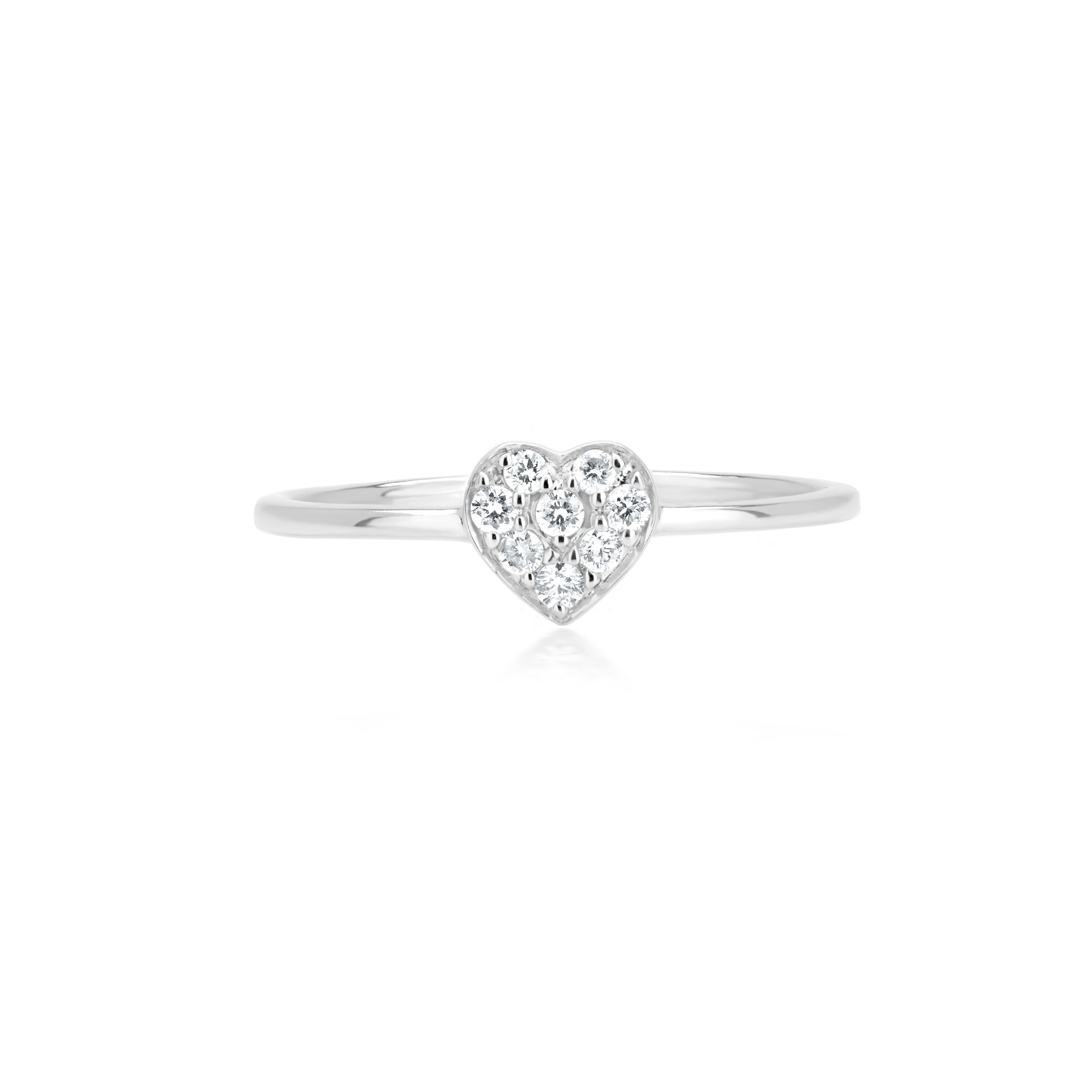 This Luxle 18K White Gold band ring has a heart-shaped structure in the middle which is made up of round full-cut white diamonds in a micro pave setting. The diamonds are I1 in clarity and GH in color, weighing 0.11 Cts. Be in that twinkling state
