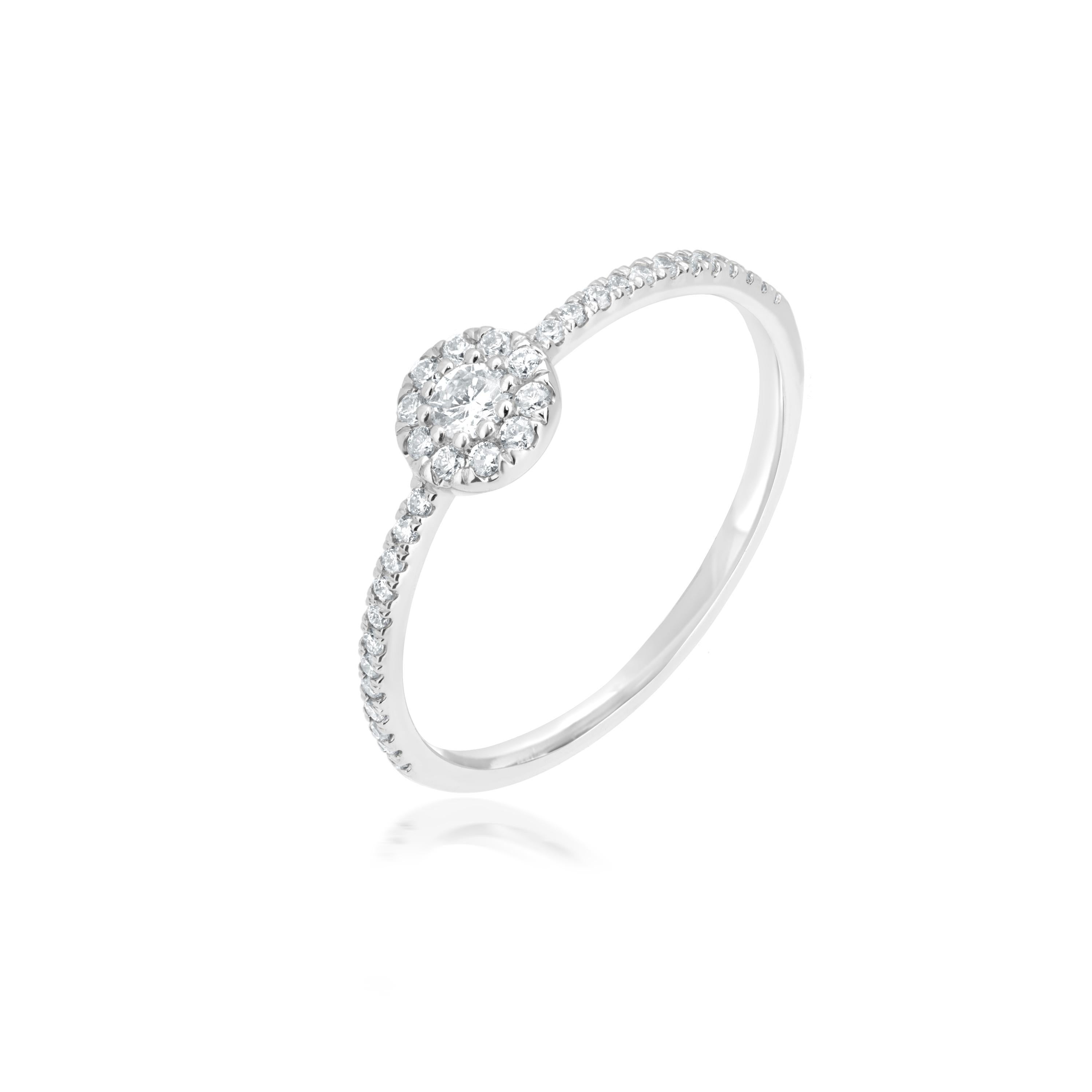 This Luxle 18K White Gold ring is the best gift for your date night. Shower your lady love with a bunch of roses and this ring that is made up of round full-cut white diamonds, set in illusion and micro pave. The diamonds are I1 in clarity and GH in