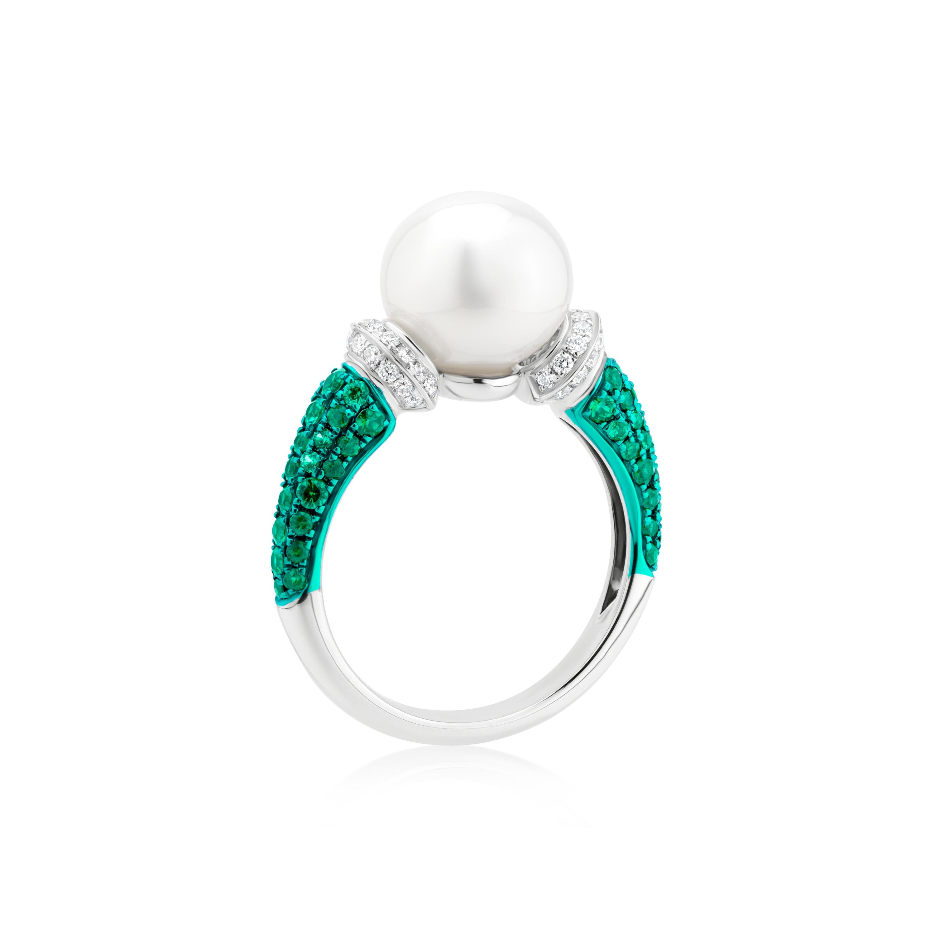 Elevate your love story with the unparalleled elegance of the Luxle South Sea Pearl, Emerald, and Diamond Engagement Ring. This masterpiece seamlessly marries the allure of the ocean's depths with the brilliance of gemstones, creating a symbol of