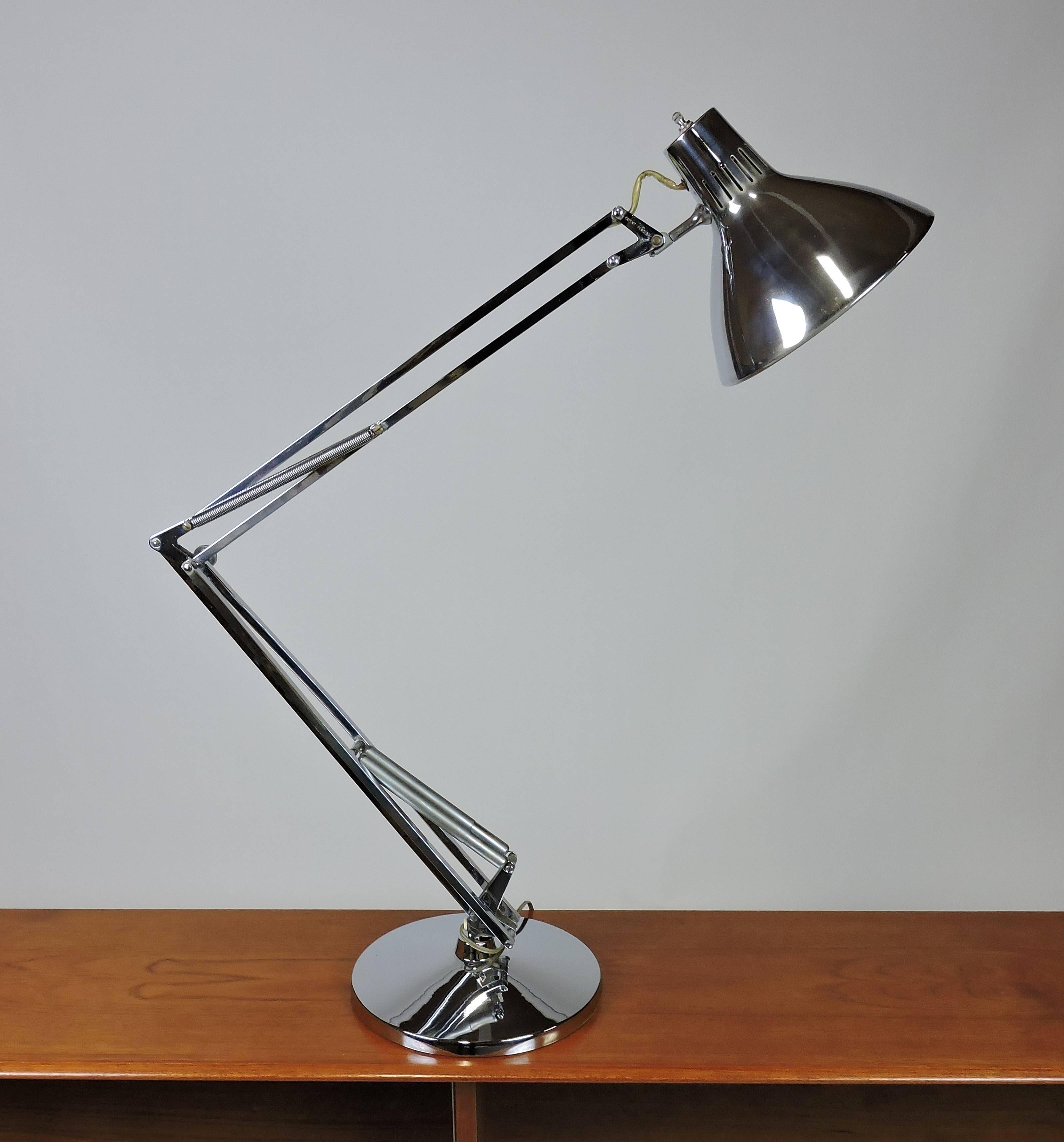 Beautiful and practical Luxo architect chrome desk lamp. This lamp was originally designed in 1937 by Jac Jacobsen and it's classic design still looks fantastic today. This has a weighted removable base and all new wiring. It can extend to 42