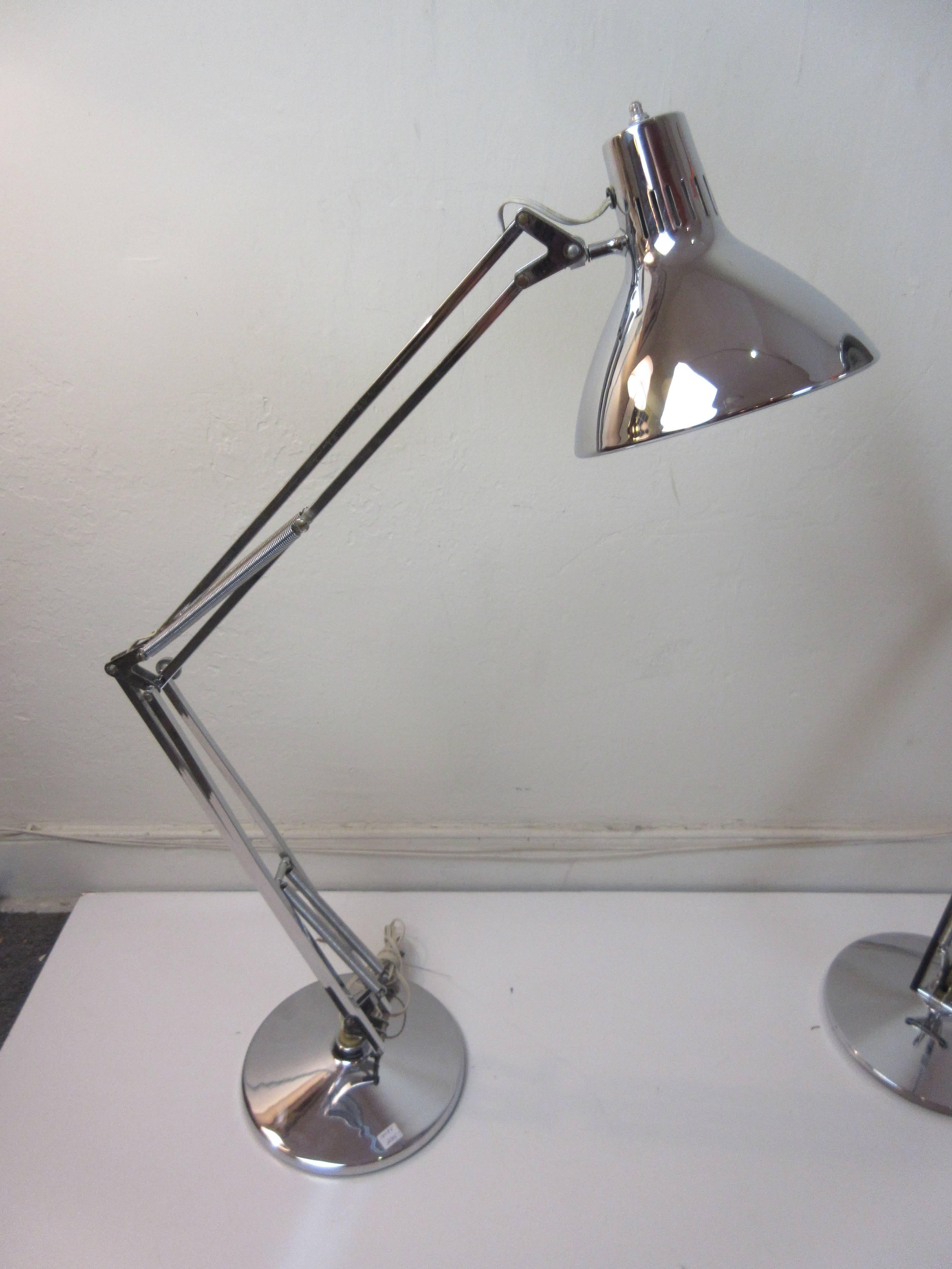 Luxo lamps by Jac Jacobsen designed in 1937. This pair was bought in 1971. One C clamp included to allow for fastening to the end of a desk or table. Flexibility of these lamps allow for almost infinite adjustments and can extend to a height of 42