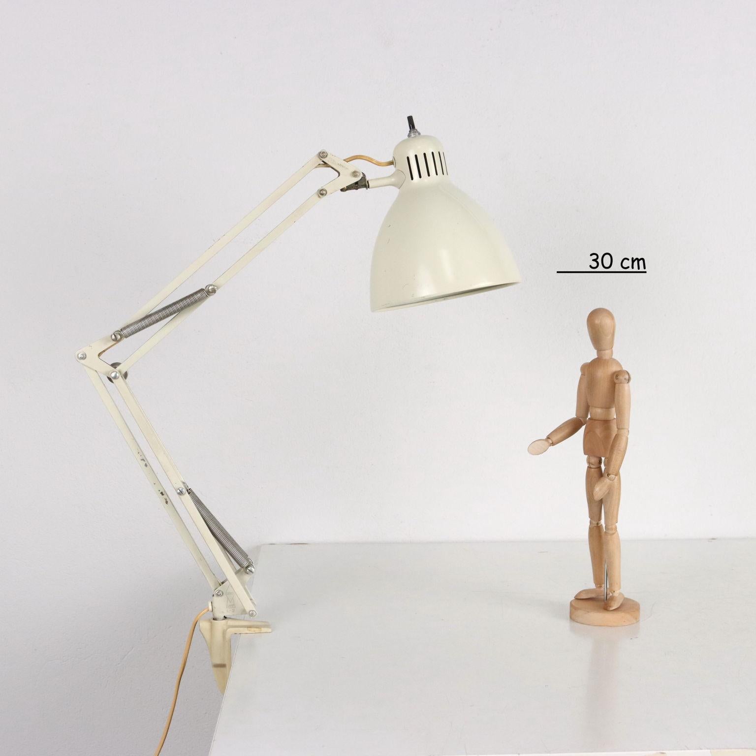 Table lamp with clamp. Enamelled metal and aluminum.
