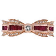 Luxueuse bague rubis 0,73 carat et rubis naturels ruban en or rose 18 carats