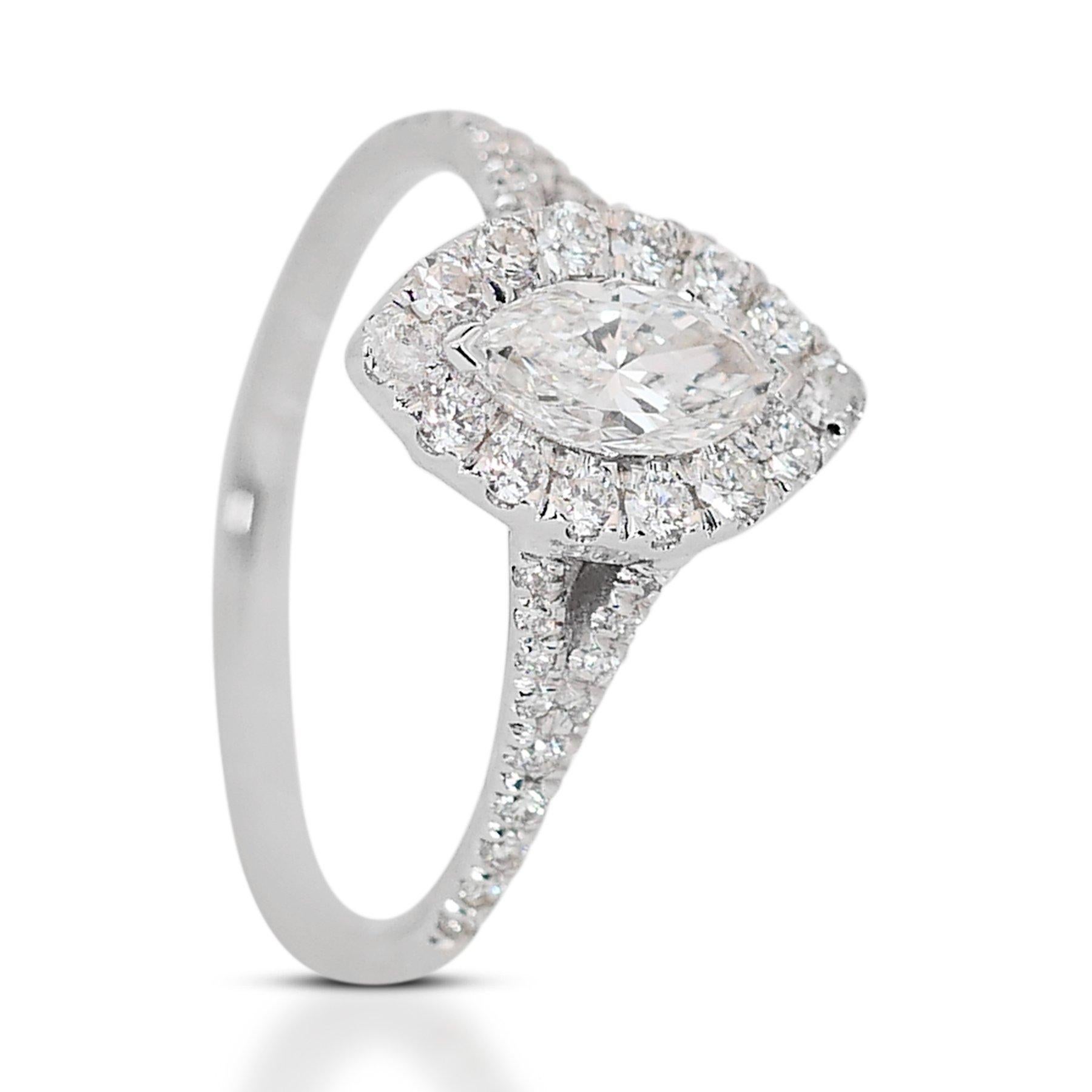 Luxurious 1.06ct Diamonds Halo Ring in 18k White Gold - GIA Certified

Elevate your collection with this luxurious diamond halo ring, a perfect choice for commemorating life's most cherished moments. Featuring a stunning 0.70-carat marquise-shaped