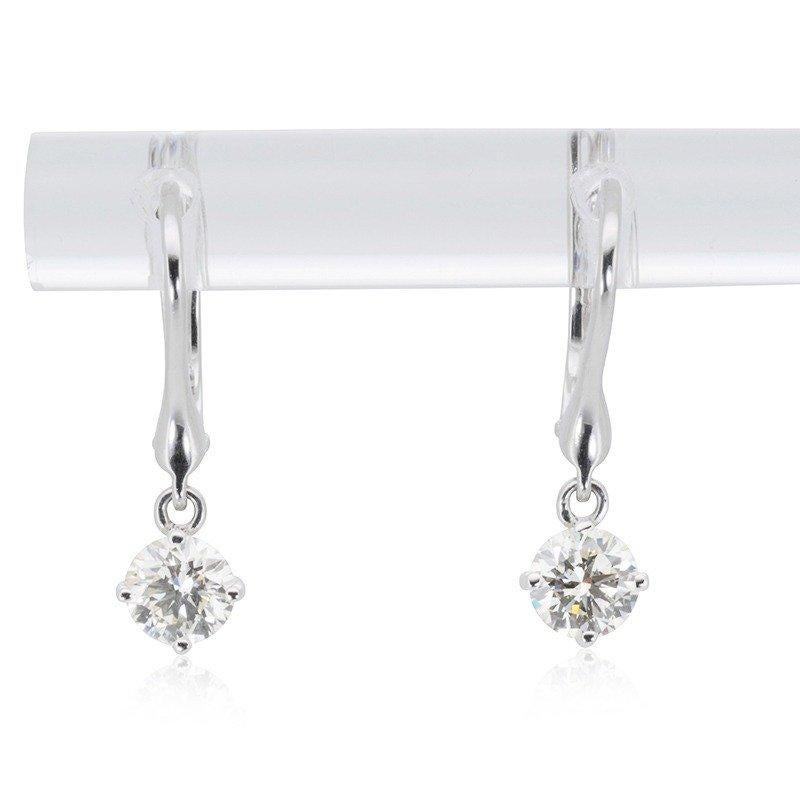 A gorgeous pair of Earrings with dazzling 1.2-carat Round Brilliant diamonds. The jewelry is made of 14K White with a high-quality polish. It comes with an AIG certificate and a fancy jewelry box.

2 diamonds main stone of 1.2 carat
cut: Round