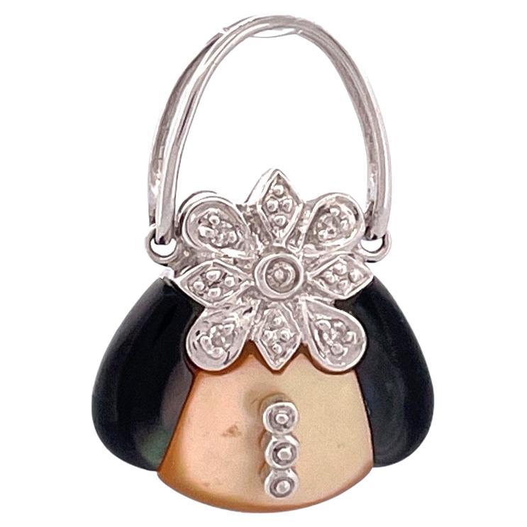 Luxueux pendentif bourse en or blanc 14k avec onyx et nacre