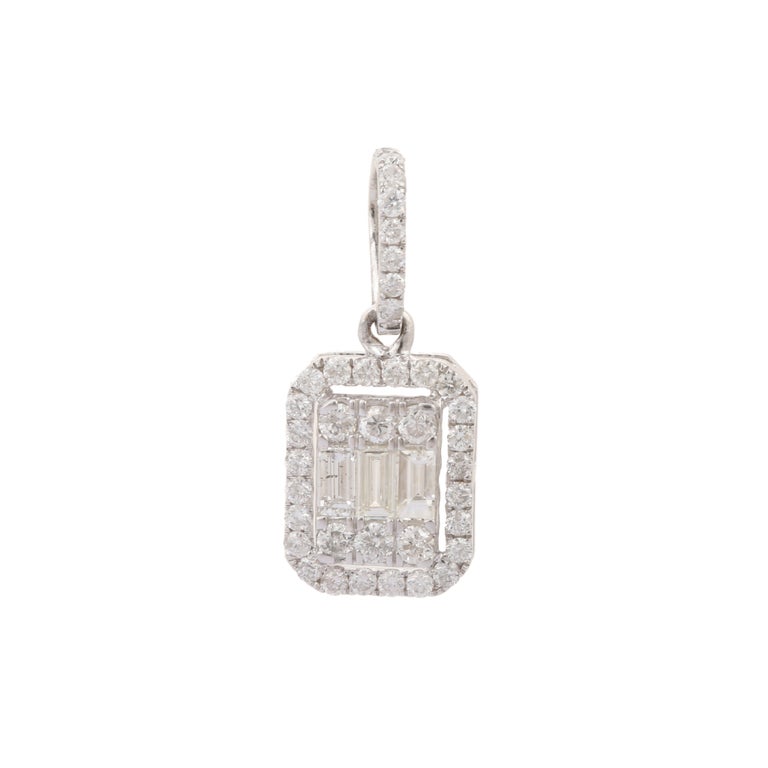 Diamond pendant in 14K Gold. It has a mix cut diamonds that completes your look with a decent touch. Pendants are used to wear or gifted to represent love and promises. It's an attractive jewelry piece that goes with every basic outfit and wedding