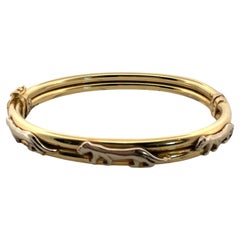Lussuoso bracciale Bangle in oro giallo 14 carati con intricato disegno di pantera