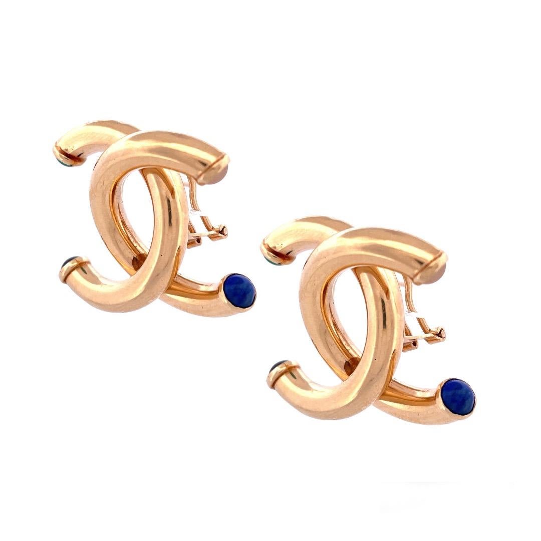 Luxurious 14k Yellow Gold Multigem Italian Double C Earrings

 Indulge in opulence with these luxurious 14k yellow gold multigem C&C earrings. Each earring features exquisite gemstones adorning the ends of the letter 'C,' creating a captivating and