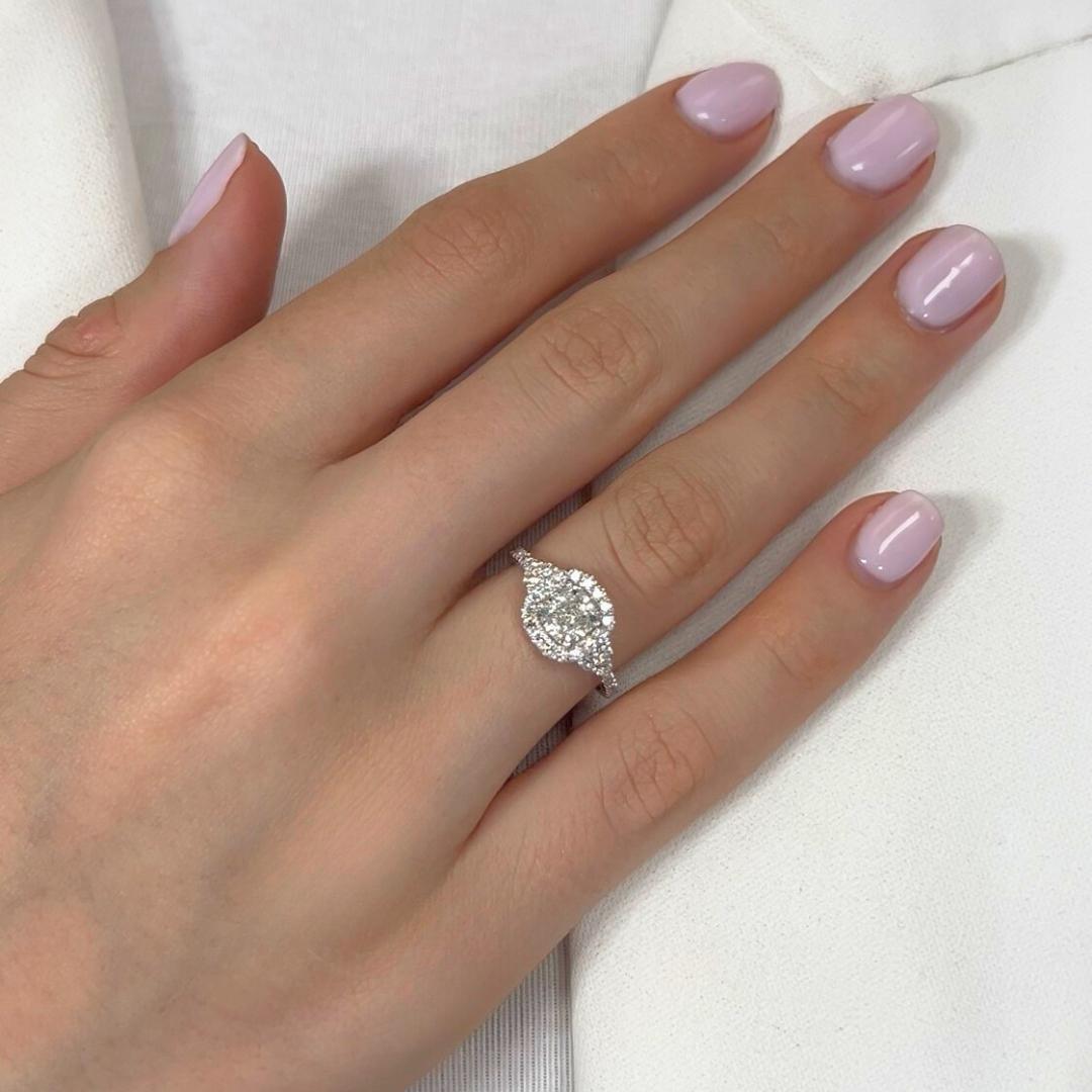 Luxurious 1.53ct Diamonds Halo Ring in 18k White Gold - IGI Certified

Graceful and timeless, this 1.53ct diamond halo ring is a dazzling choice for any occasion. The centerpiece features a 1.02ct cushion-cut diamond radiating striking brilliance.