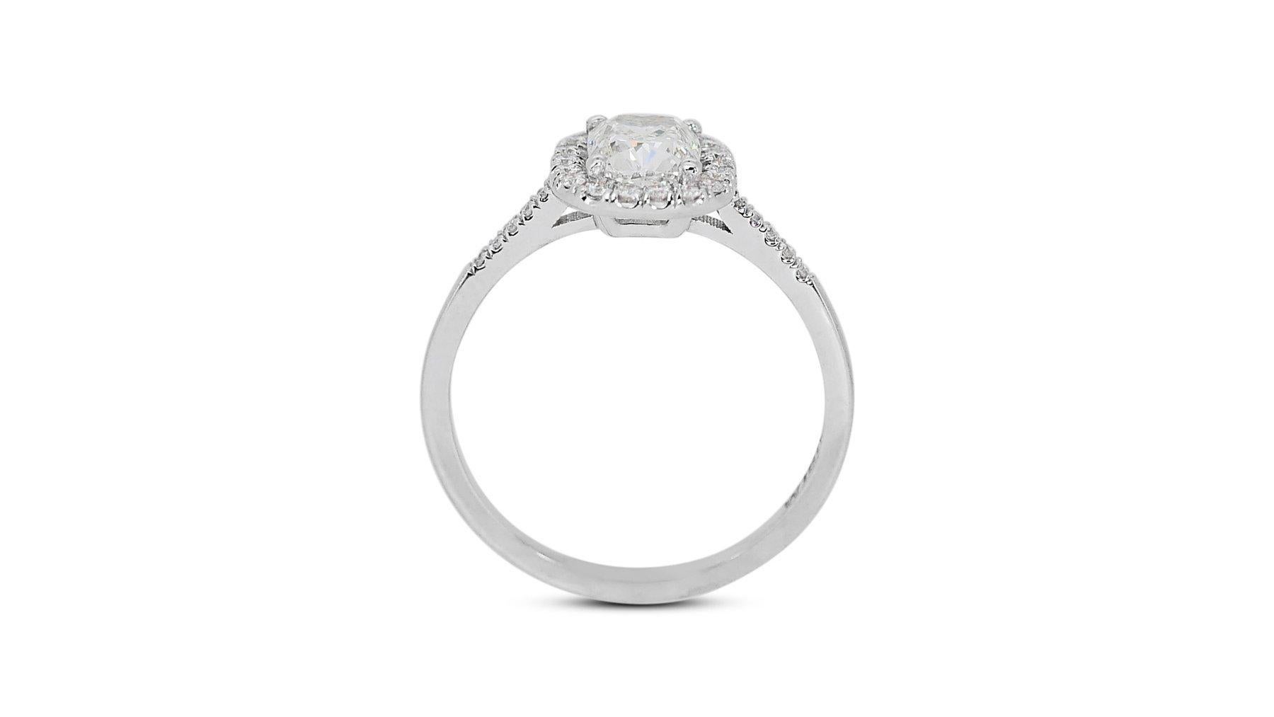 Luxurious 1.71ct Diamond Halo Ring in 18k White Gold - GIA Certified

Experience luxury with this exquisite 18k white gold halo ring, featuring a captivating 1.49-carat cushion-cut diamond as the centerpiece. Encircling the main stone are 28