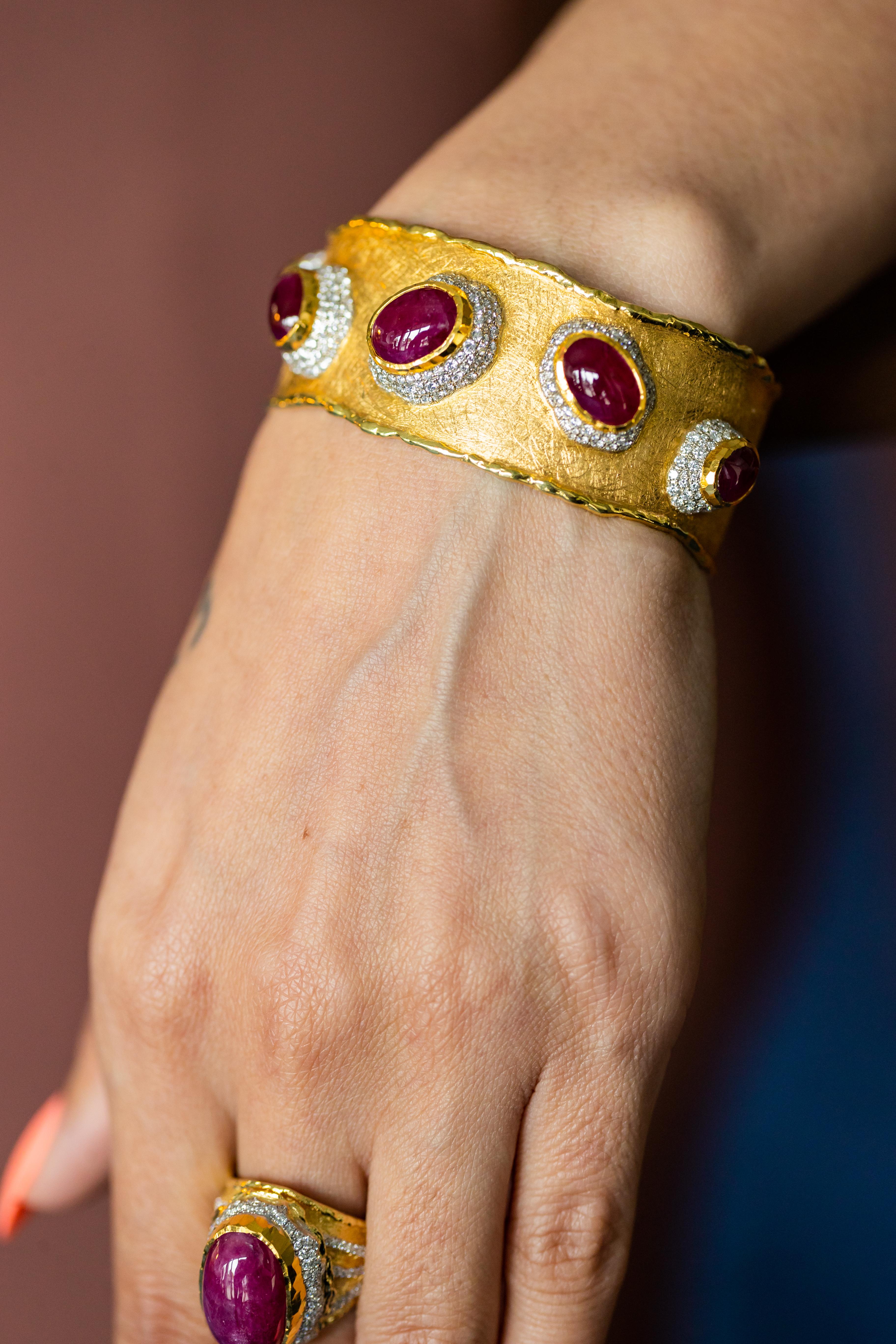 Indulge in the elegance of this extraordinary bracelet, a masterful creation by the renowned designer Victor Velyan. This opulent piece features a stunning array of Greenland rubies, totaling an impressive 21.21 carats. These exquisite rubies, known