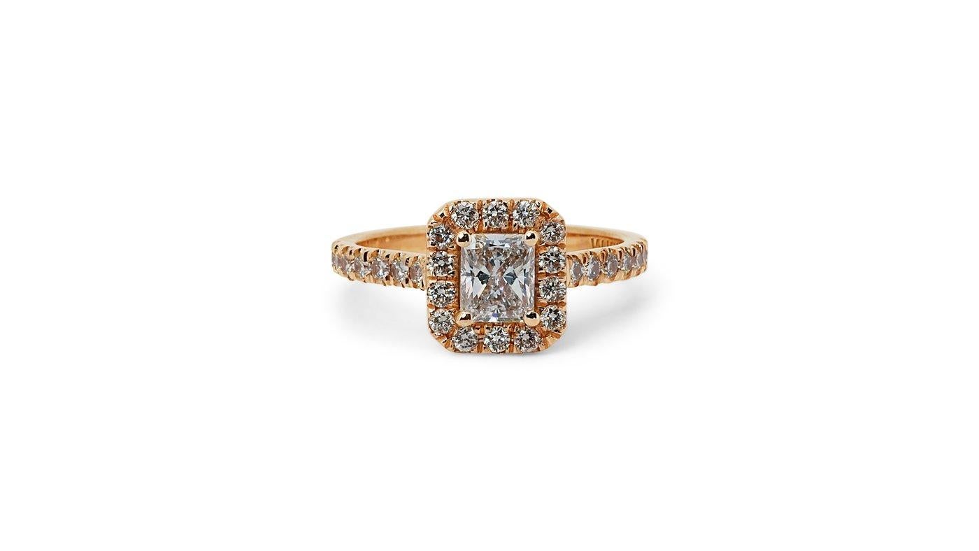 A beautiful ring with a dazzling 0.71 carat radiant natural diamond. It has 0.5 carat of side diamonds which add more to its elegance. The jewelry is made of 18K Rose Gold with a high quality polish. It comes with GIA certificate and a fancy jewelry