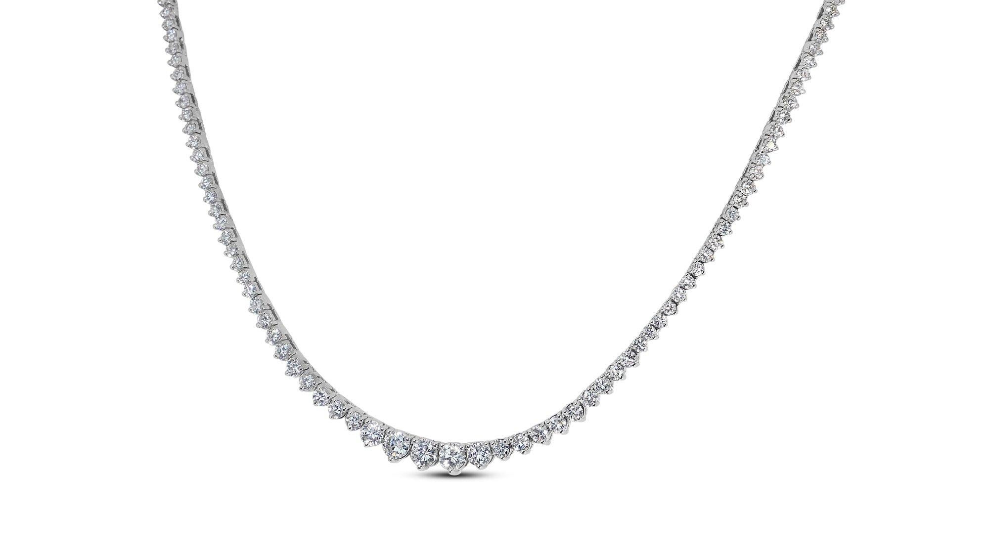 Luxurious 18k White Gold Diamond Necklace w/7.63 ct - IGI Certified

This exquisite 18k white gold diamond necklace is a testament to timeless elegance and unparalleled craftsmanship, featuring a breathtaking ensemble of 196 round diamonds that