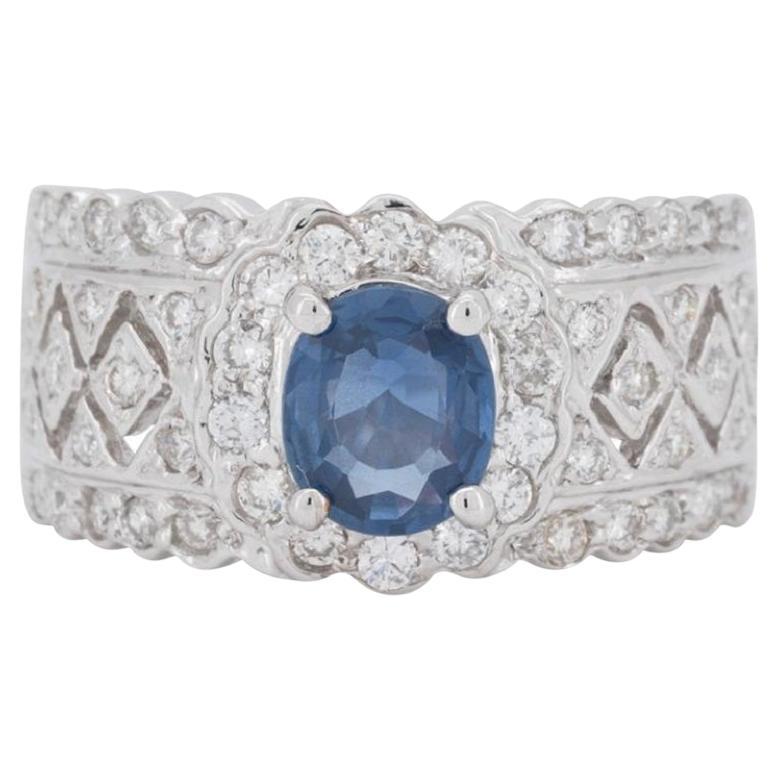Stunning halo ring made from 18k white gold with 0.55 total carat of oval sapphire and round brilliant diamonds. This ring comes with a fancy box.

Main Stone:
1 sapphire main stone of 0.05 ct. 
cut: oval
color: blue

Side stones:
52 diamond side