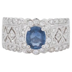 Luxurious 18K White Gold Halo Ring with 0.55 Ct Natural Sapphire and Diamonds