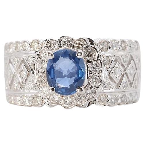 Luxurious 18K White Gold Halo Ring with 0.55 Ct Natural Sapphire and Diamonds For Sale