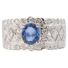 Luxurious 18K White Gold Halo Ring with 0.55 Ct Natural Sapphire and Diamonds