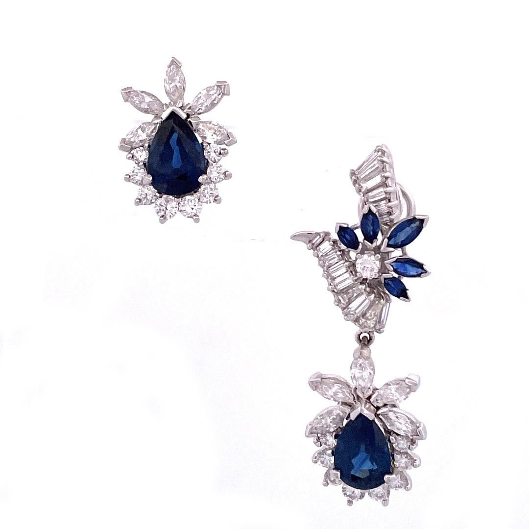 Luxurious 18k White Gold Sapphire and Diamond Convertible Earrings

Indulge in the opulence of these exquisite 18k white gold earrings adorned with a captivating combination of precious gemstones. Featuring a magnificent pear-cut sapphire weighing