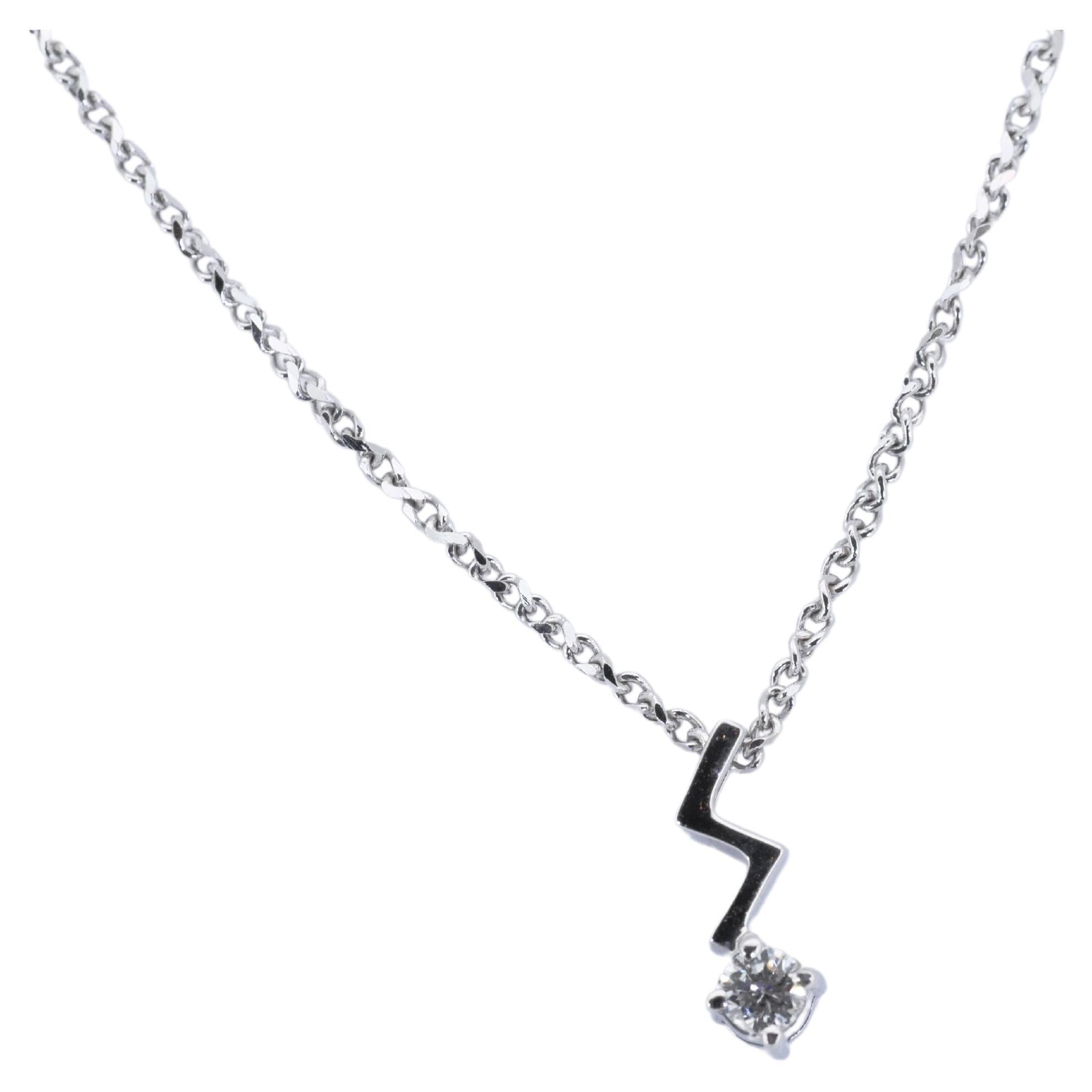An elegant solitaire necklace with a dazzling 0.1 carat round brilliant diamond. The jewelry is made of 18k white gold with a high quality polish. It comes with a fancy jewelry box.

Product Details:

Metal: 18K White Gold

Main Stone: 
1 diamond