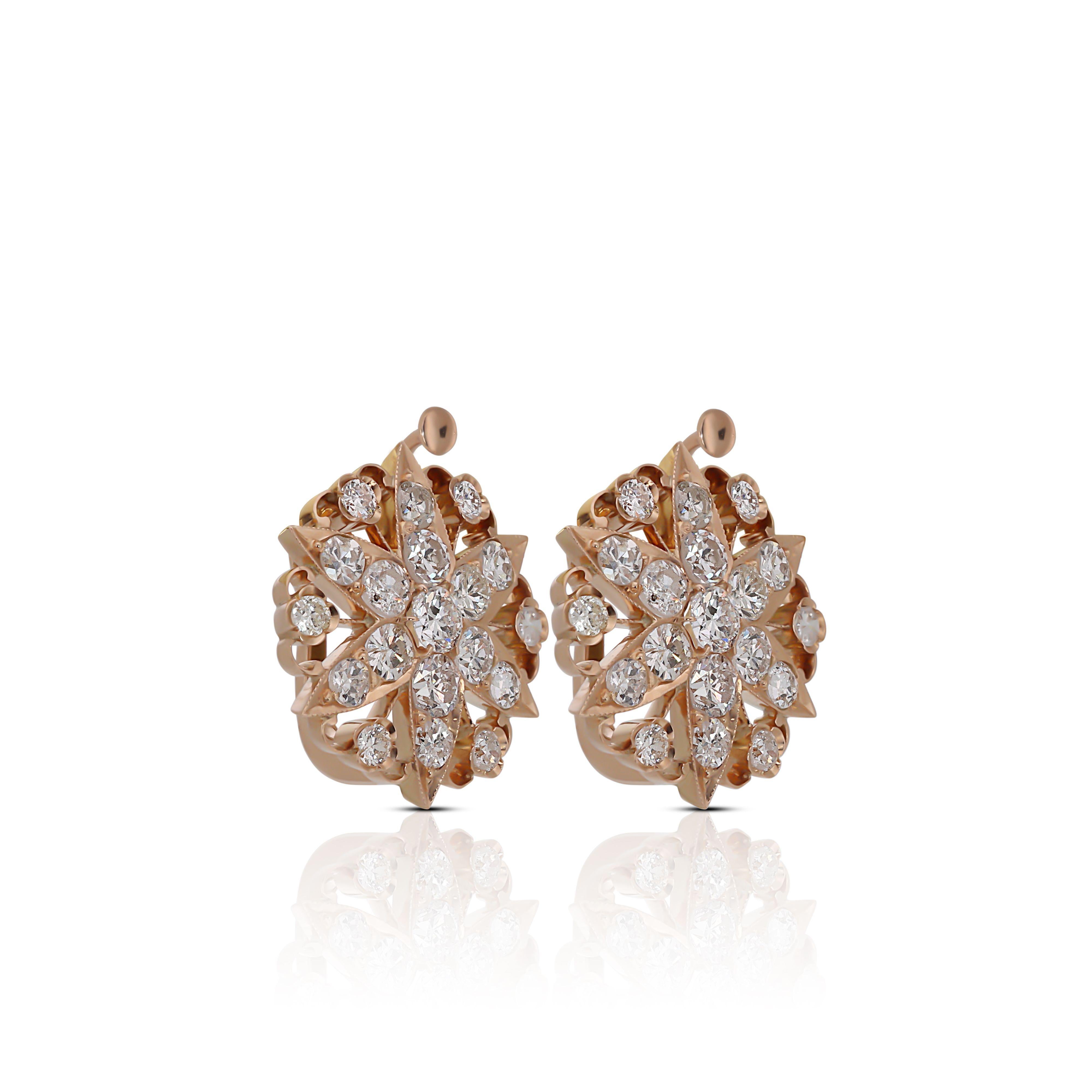 A gorgeous pair of cluster earrings with a dazzling 0.26 carat round brilliant natural diamonds. It has 1.8 carat of side diamonds which add more to its elegance. The jewelry is made of 18k Yellow Gold with a high quality polish. It comes with a