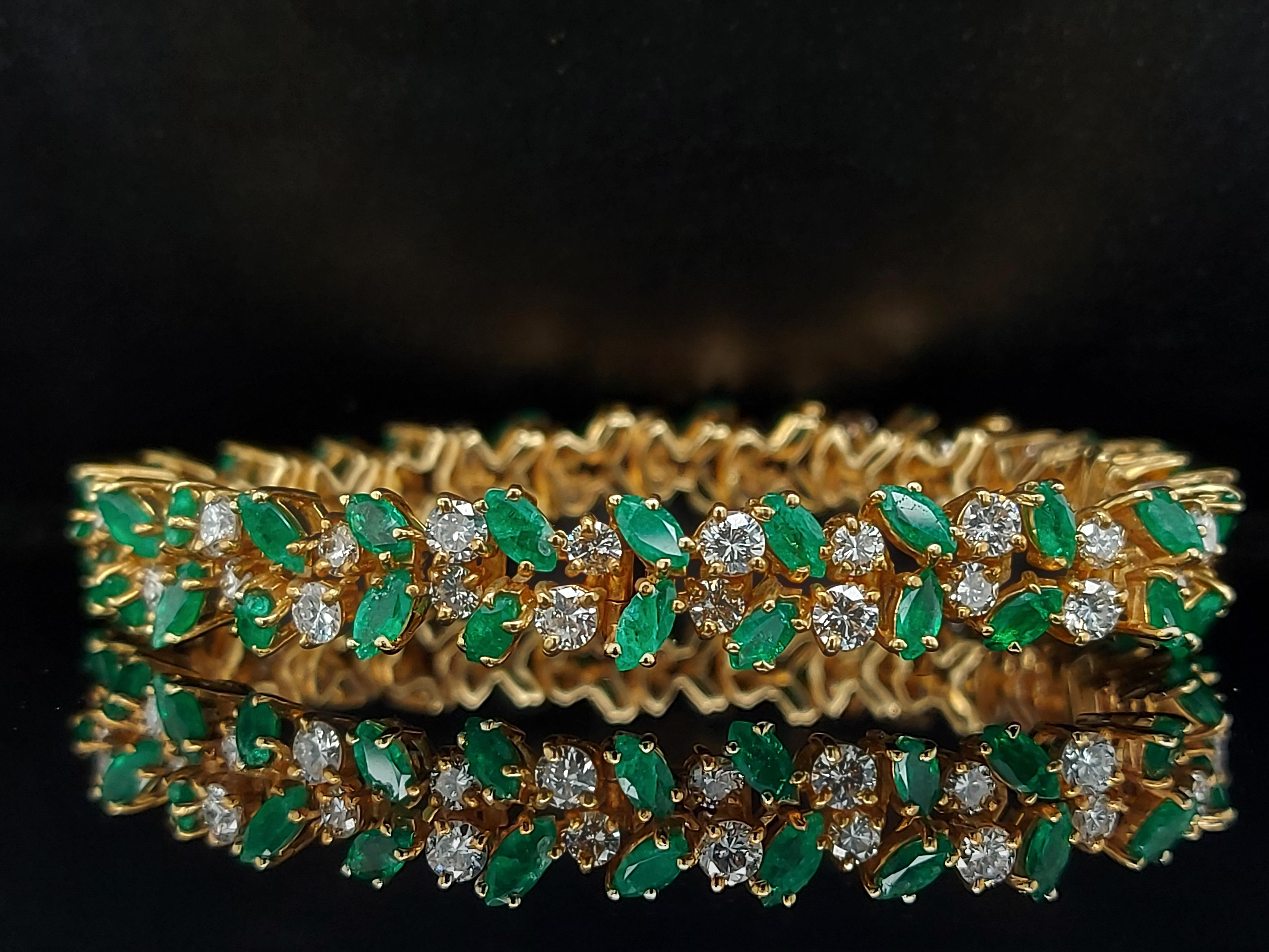 Luxurious Bracelet With 6.75 Ct Diamonds and 10 Ct Emeralds

Diamonds: Brilliant cut diamonds, together ca. 6.75 cts

Emeralds: Marquise cut emeralds, together ca. 10 cts

Material: 18 kt yellow gold

Measurements: Will max fit a 16 cm wrist

Total