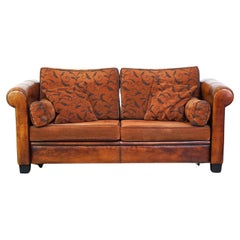 Luxurious 2.5-seater sheep leather sofa with fabric cushions in English style