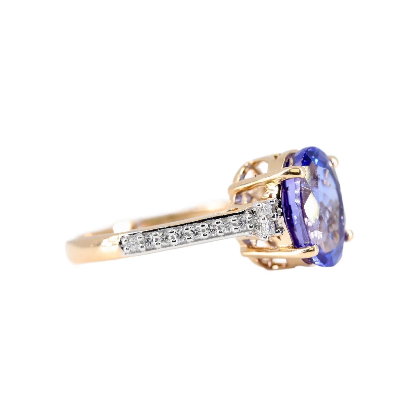 A luxurious tanzanite, and diamond ring in 18 karat yellow gold. Centered by a 3.80 carat oval cut tanzanite of beautiful vivid color. Accented with twenty pave set diamond of 0.24ctw with H color and VS2 clarity.

Hallmarked as 18 karat