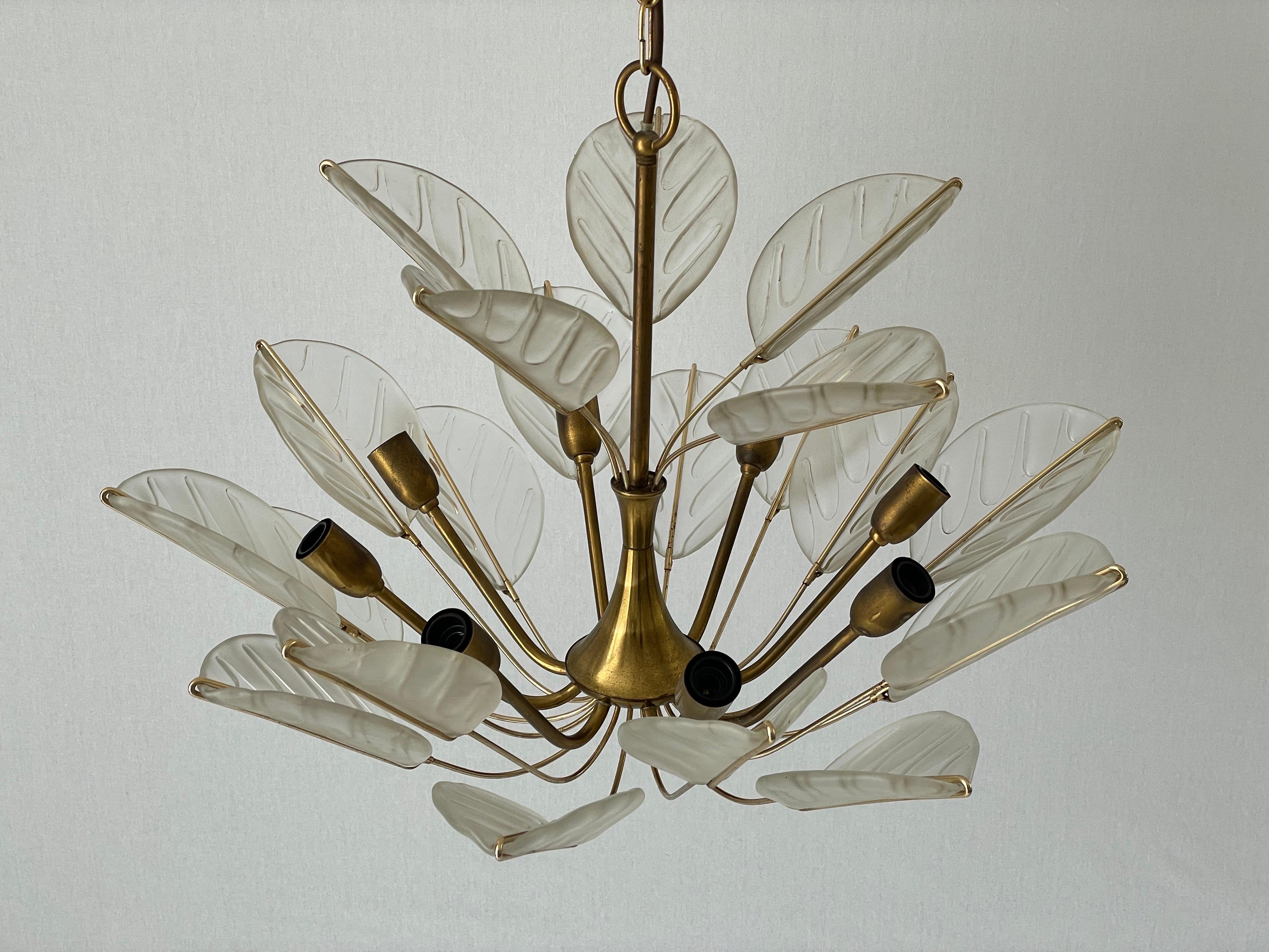 Luxurious 8-armed Brass Chandelier with Crystal Glass Leaves, 1960s, Germany

Lampshade is in very good vintage condition.

This lamp works with  8x E14 light bulbs. 
Wired and suitable to use with 220V and 110V for all