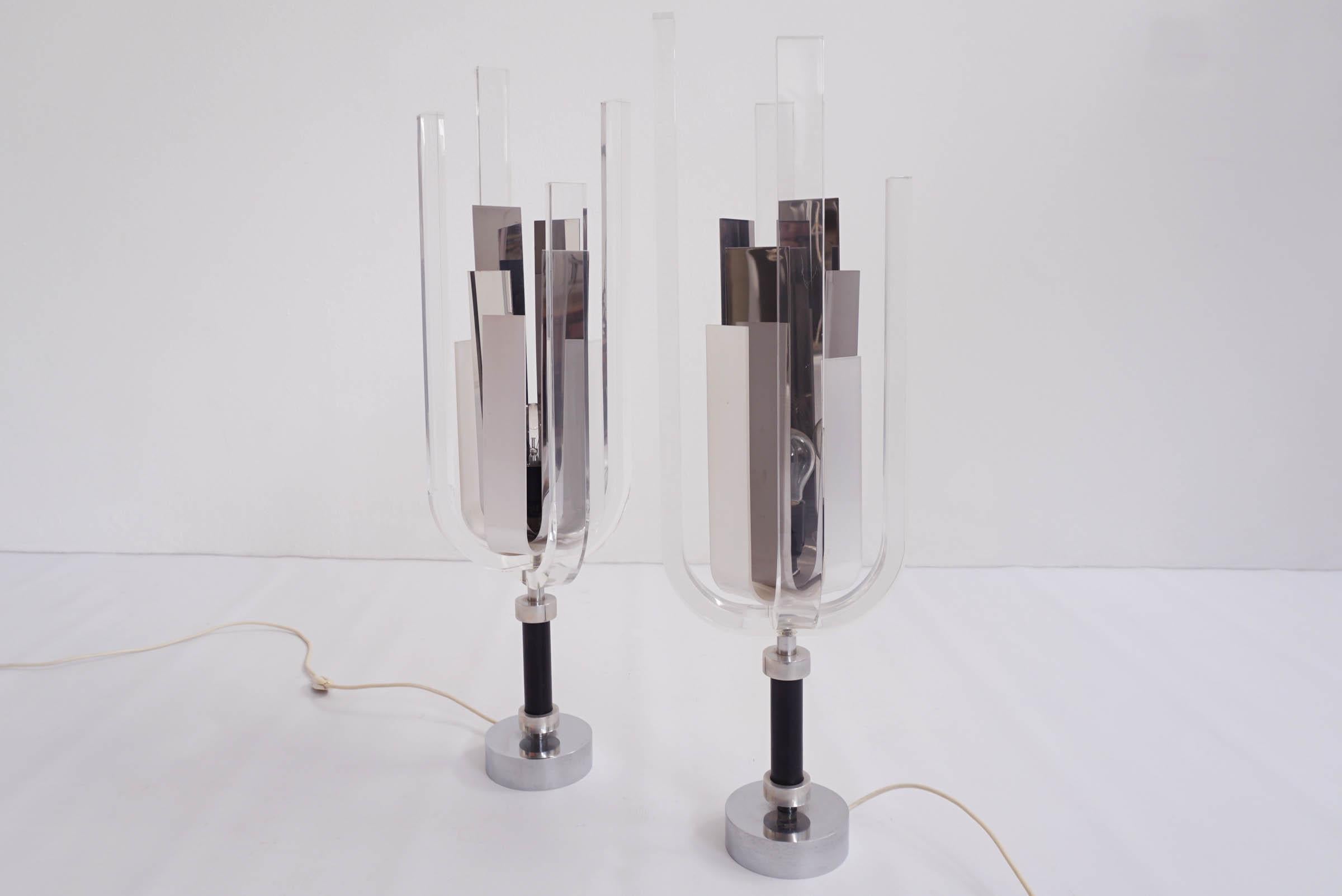 Shining plexi and chrome lamps designed by Philippe Jean, France, 1970
Stem is covered in leather
Signed by the Designer on the chrome base.