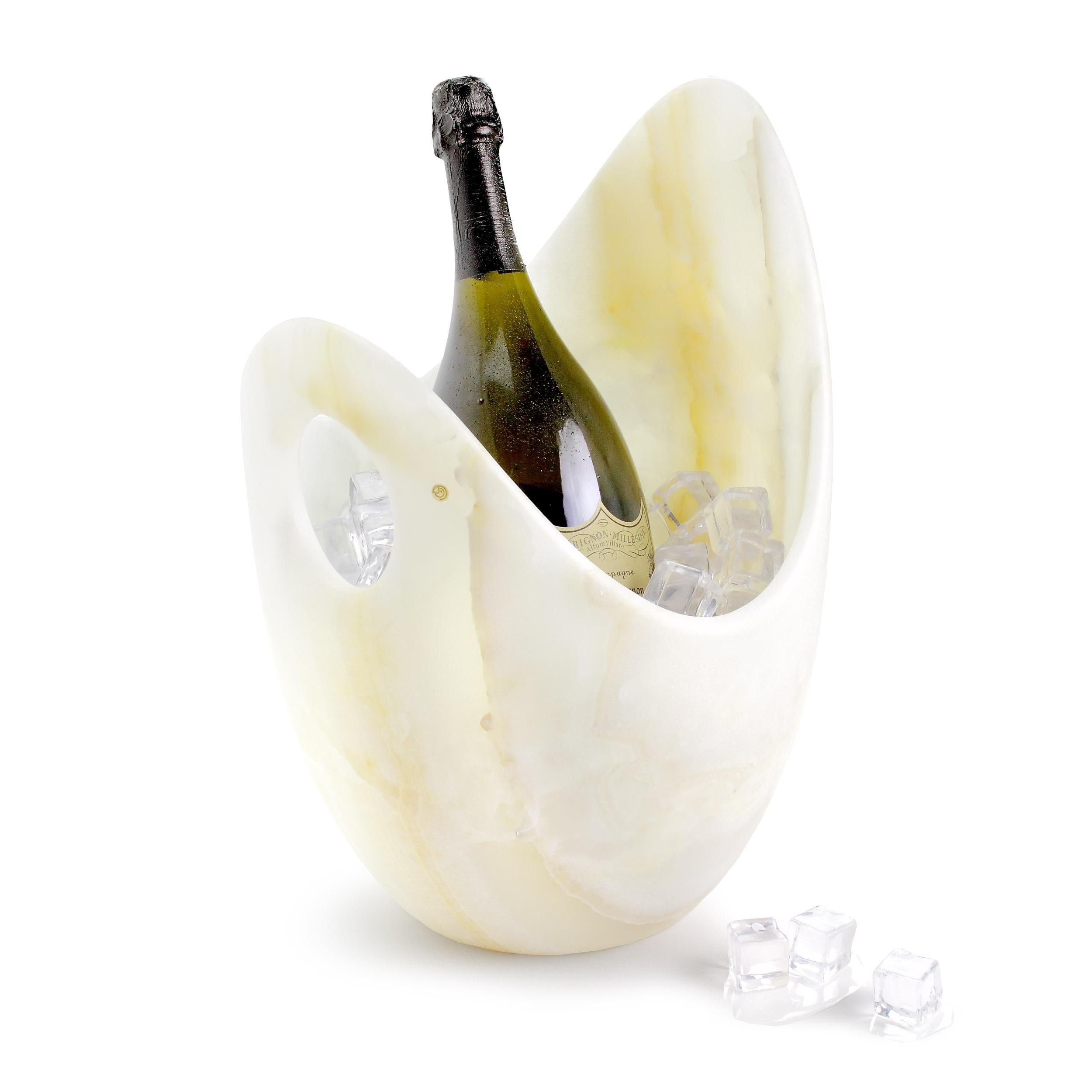 Luxurious and big Champagne bucket sculpted by hand from a solid block of white onyx. The polished finishing underlines the transparency of the onyx making this a very precious object. 

Champagne bucket dimensions: L 28 x W 29 x H 41 cm.