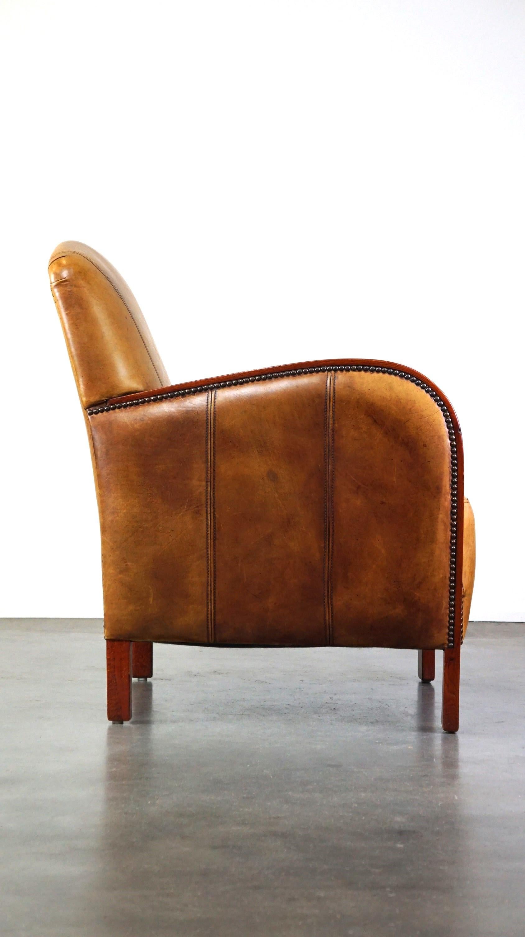 Luxueux fauteuil Art Déco en cuir de vache avec accoudoirs en bois en vente 2