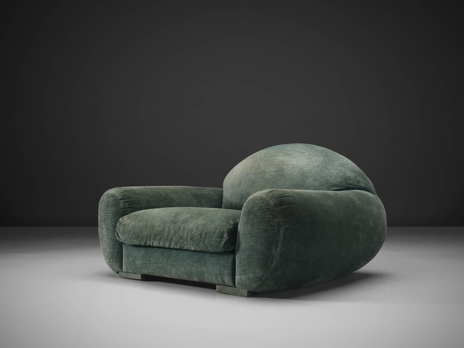 Lounge chair, green blue fabric, France, 1940s. 

Wide and comfortable custom made chair in fabric velvet like upholstery. Truly extraordinary luxurious lounge chair that features a very deep seat and rounded, curved armrests. This piece is as