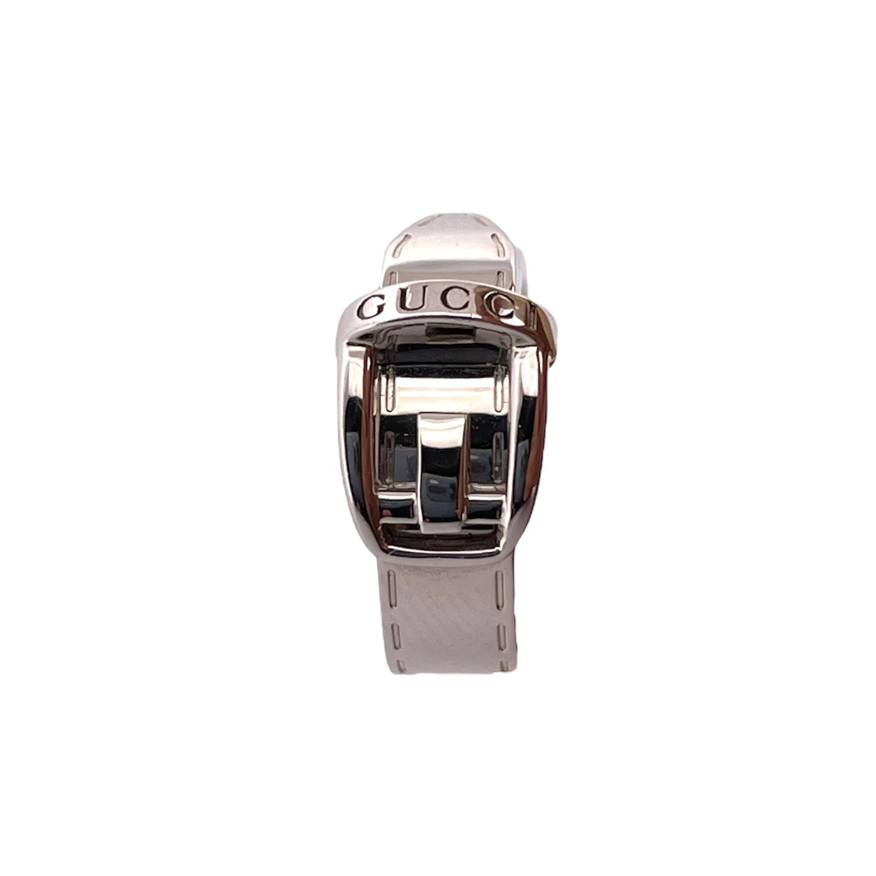 Elevate your style with this exquisite Gucci Belt-Inspired Ring, a symbol of luxury and fashion-forward sophistication. 
Crafted in opulent 18K white gold and weighing 10.02 grams, this ring exudes elegance and is a statement piece that deserves a