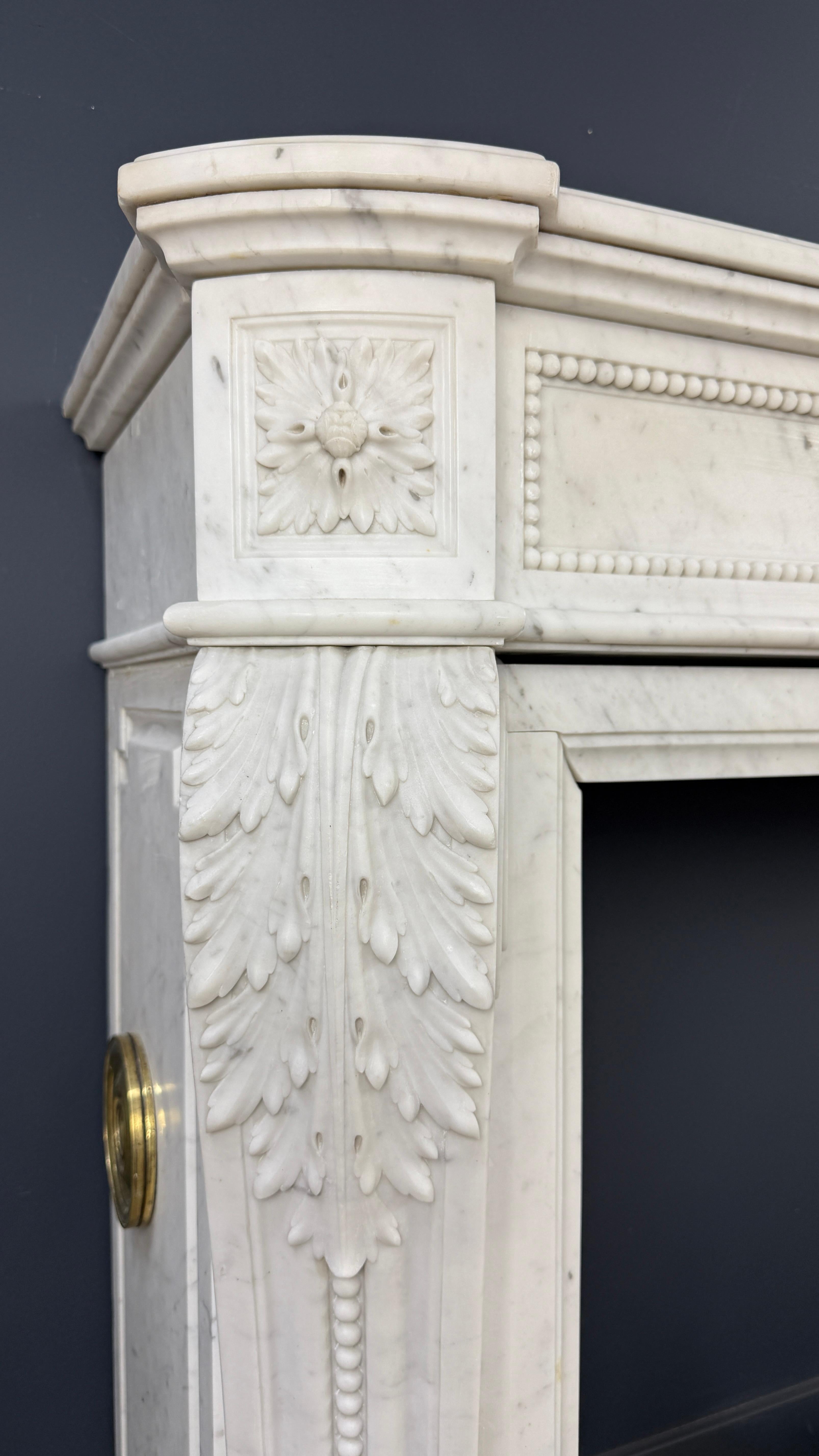 Luxurious French Louis XVI Fireplace Mantel in Carrara Marble with Rich Ornament For Sale 10