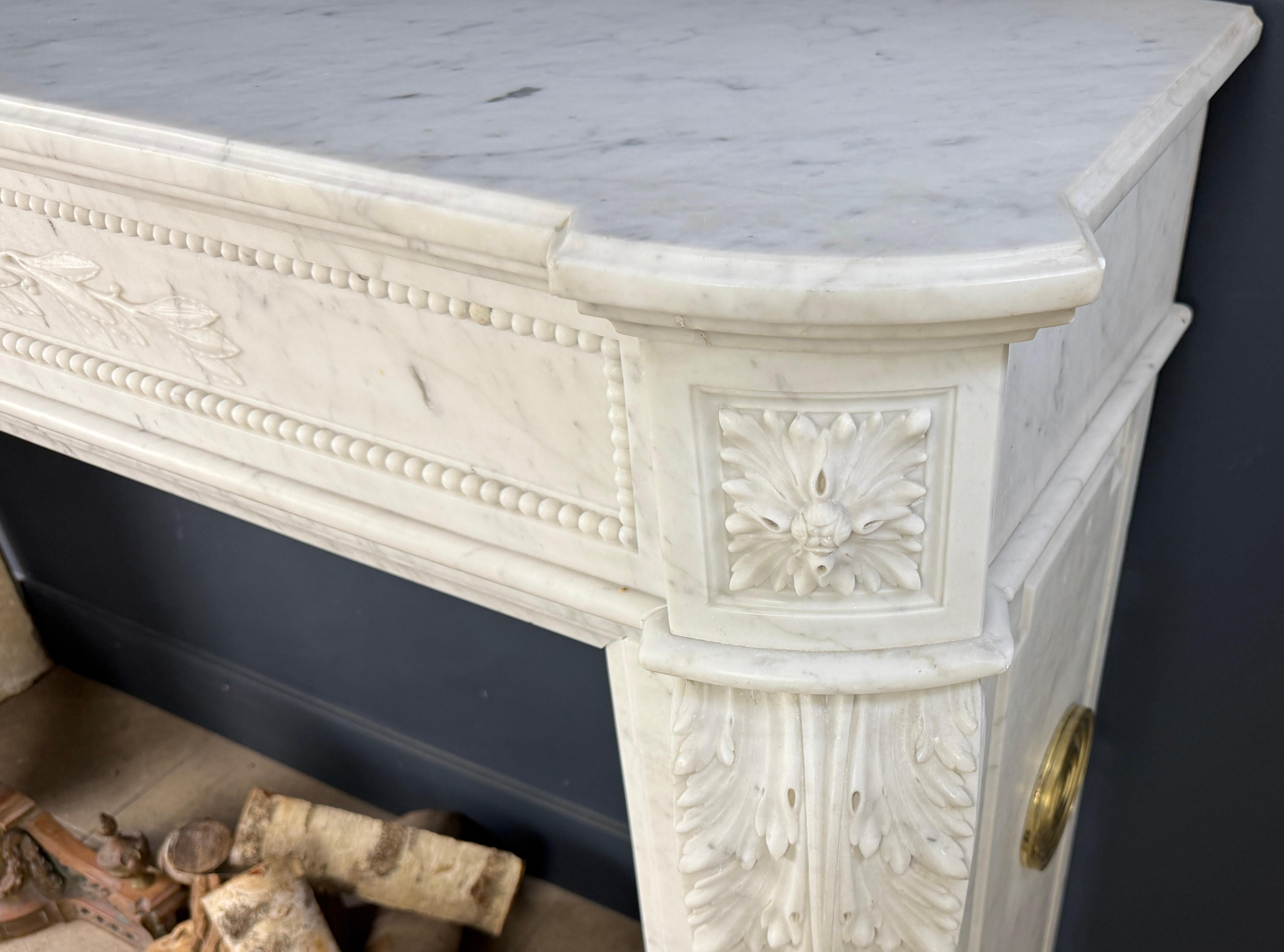 Luxurious French Louis XVI Fireplace Mantel in Carrara Marble with Rich Ornament For Sale 11